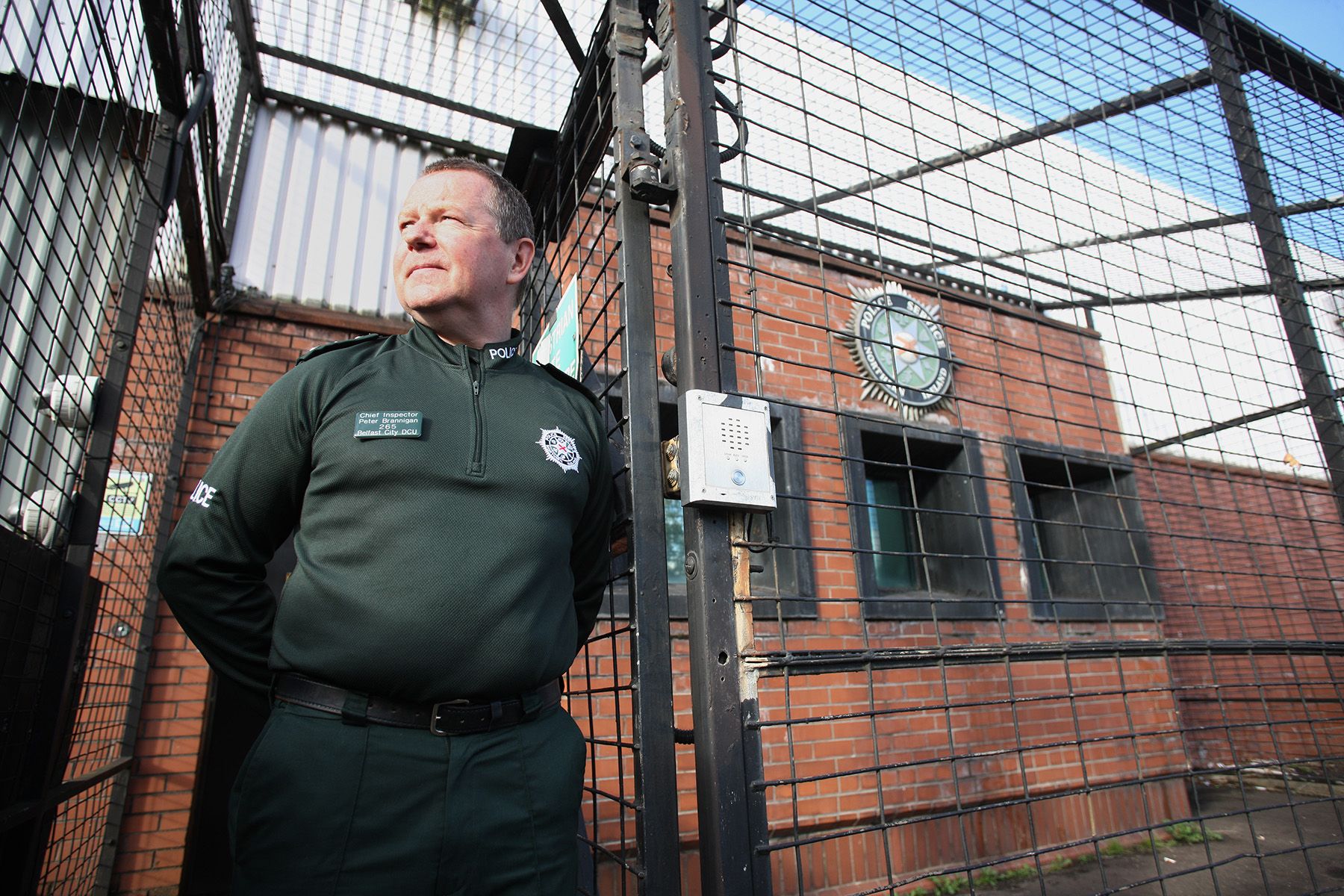 NORMALISING POLICING: Chief Inspector Peter Brannigan, the PSNI\'s West Belfast Commander has called for the external wall of Woodbourne to be pulled down