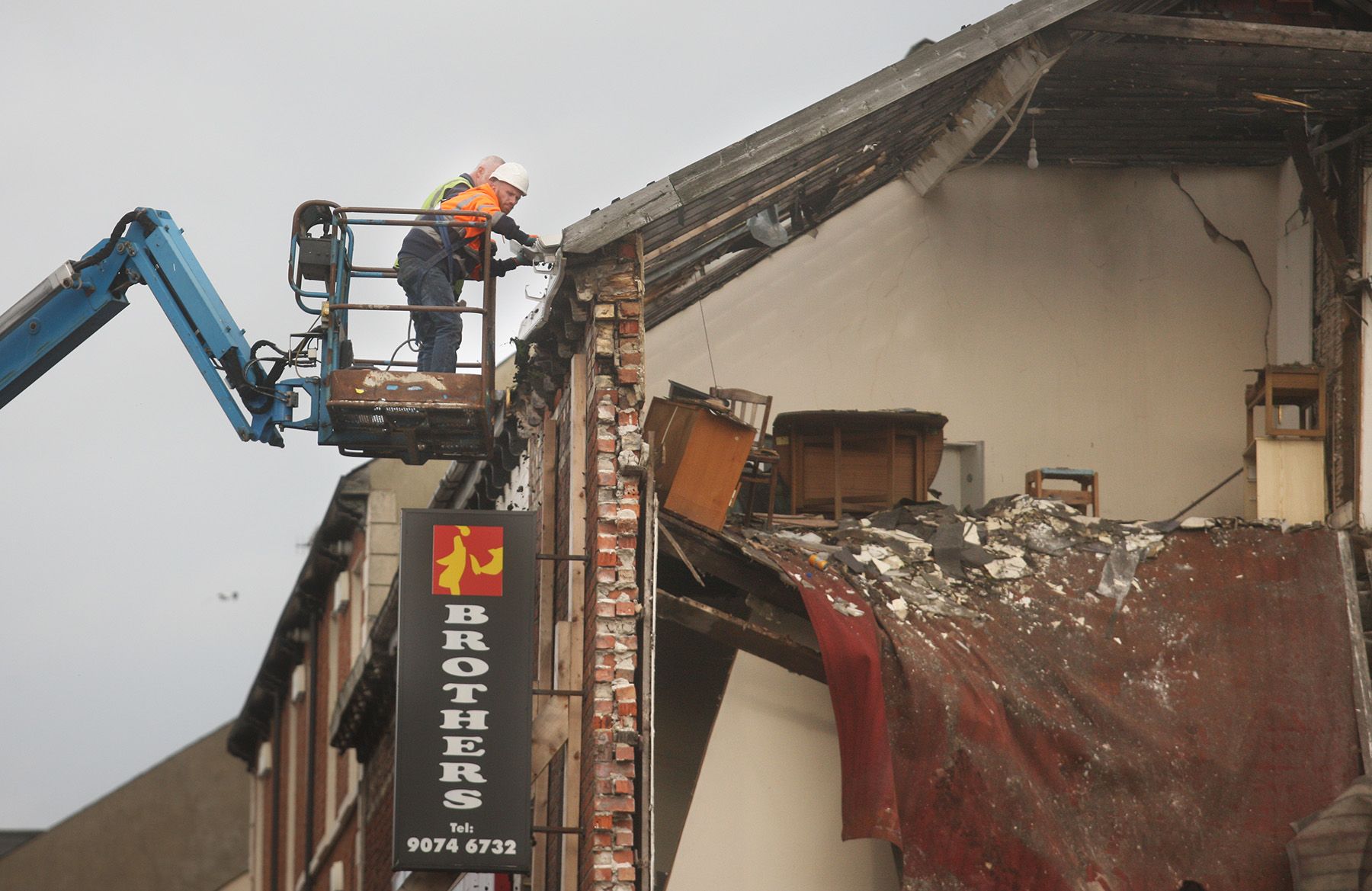 DEMOLITION: Contractors begun demolition work on the collapsed building on the Antrim Road this week