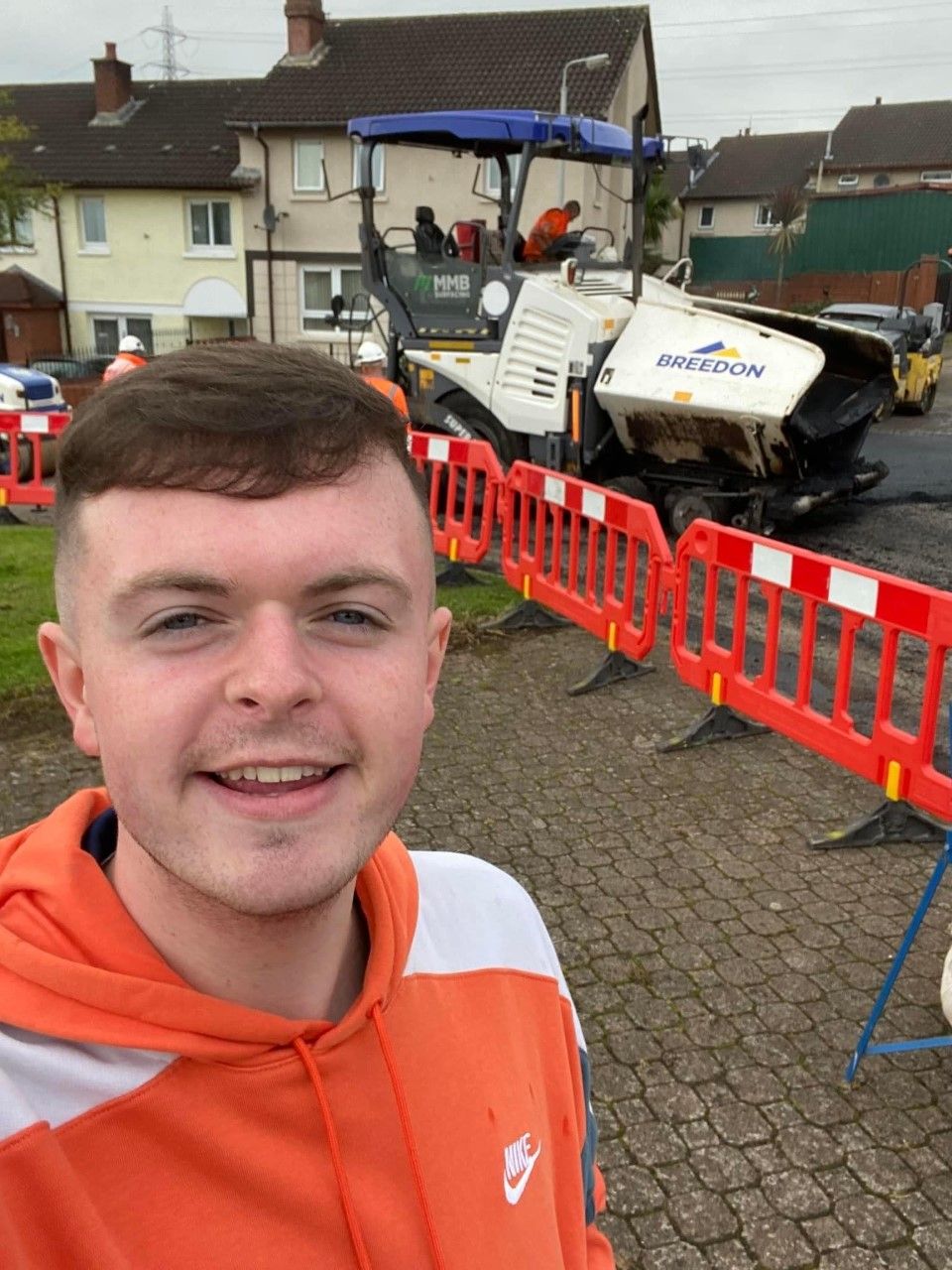 Cllr Caoimhín McCann at the site of the resurfacing in Glenbawn.