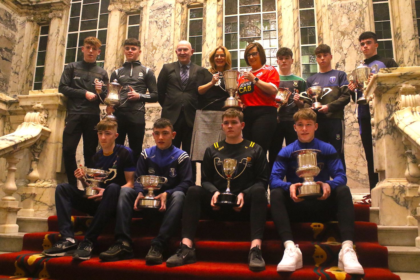 Captains from the county champions along with Lord Mayor Christina Black, Stephen Anton from sponsors fonaCAB and Caroline McLaughlin, St Paul\'s Chairperson, at the launch of the Ulster Minor Club Football Tournament at City Hall on Monday