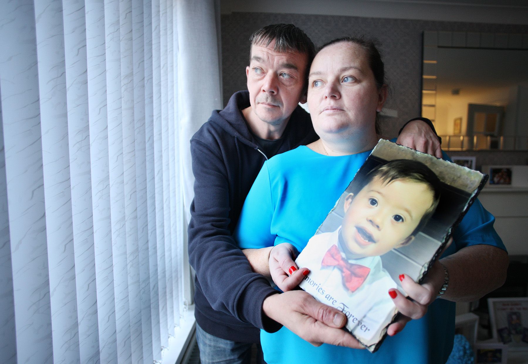 DEVASTATED: Joanne Corry and her husband John at their home in the Market area