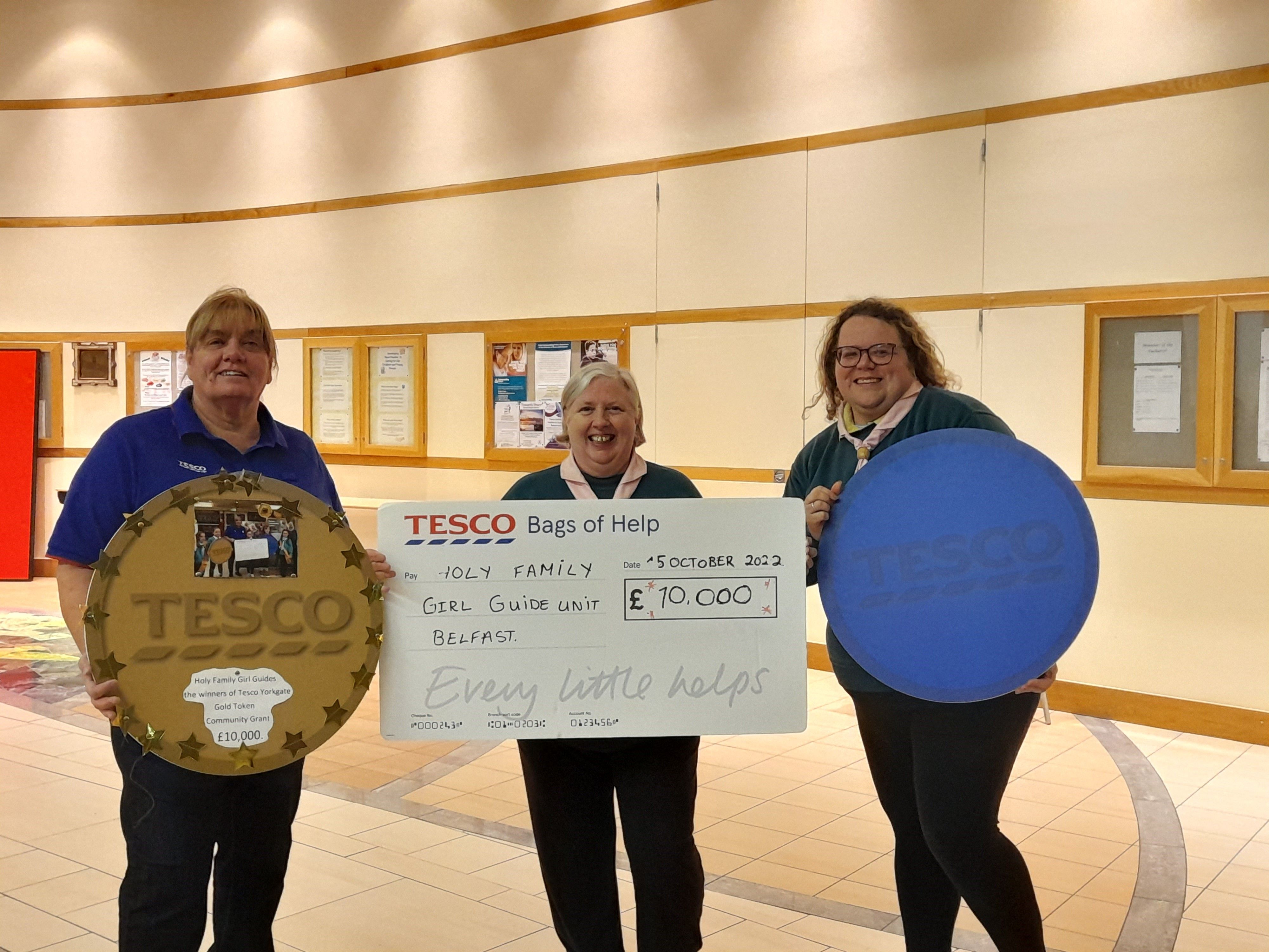 GRANT: Donna McCotter (Tesco Yorkgate Community Champion), Mairead Walsh (Unit Leader Holy Family Guide Unit) and Maeve Heaney (Unit Treasurer Holy Family Guide Unit)