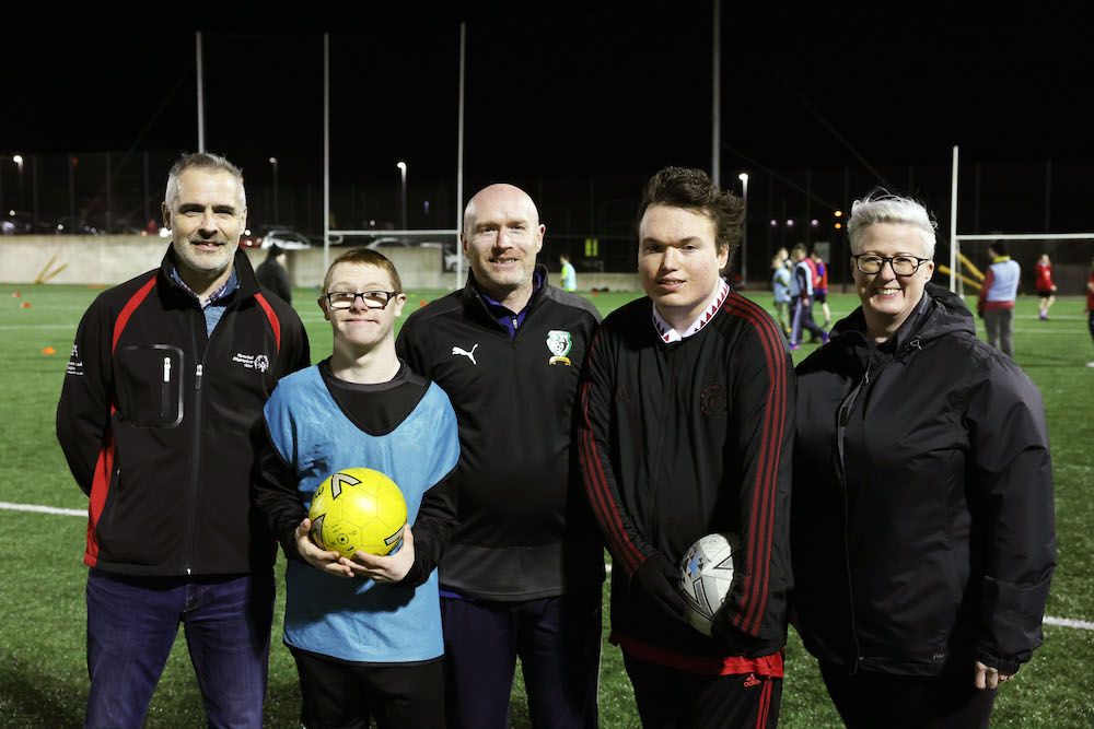 Shaun Cassidy, Regional Director Special Olympics Ulster; Pearse Devlin, player; Darren Coyle Head Coach at St James Swifts FFA; Liam McNearney,player and Susan McCall, Regional Development Officer, Special Olympics Ulster 