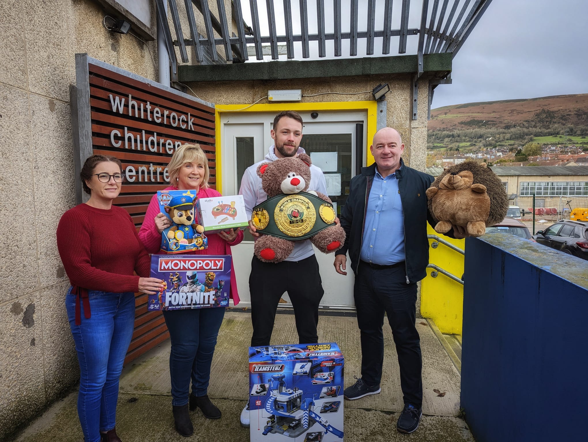 APPEAL: Champion boxer Padraig McCrory and Packy McDonnell from the Bullring shop joined Noleen McMahon and Deirdre Walsh from the Whiterock Children\'s Centre to launch the appeal 