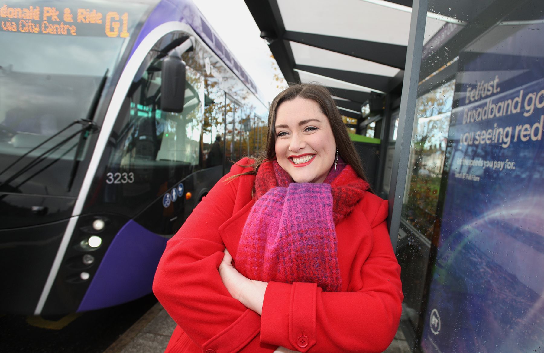 ALL ABOARD: Andersonstown woman Caoimhe Ní Chathail at a Glider stop