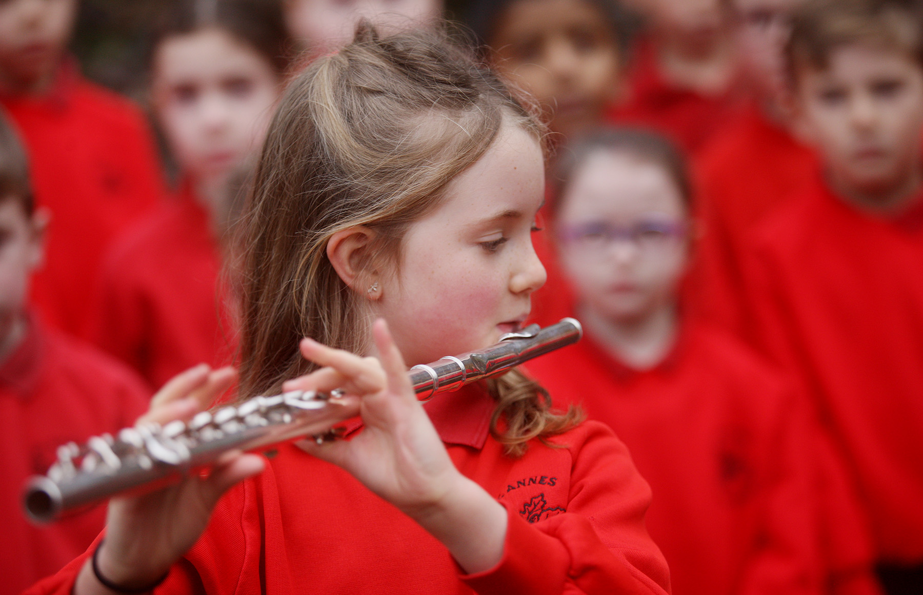 BLESSING: Parish Priest Fr Peter O'Hare joined staff and students to bless the new equipment 