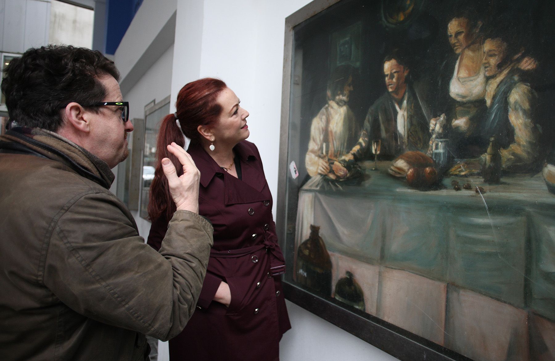 HISTORY TOUR: Catherine Mulawka and Seán Napier admire a painting of Wolfe Tone in the Cathedral Quarter area of Belfast