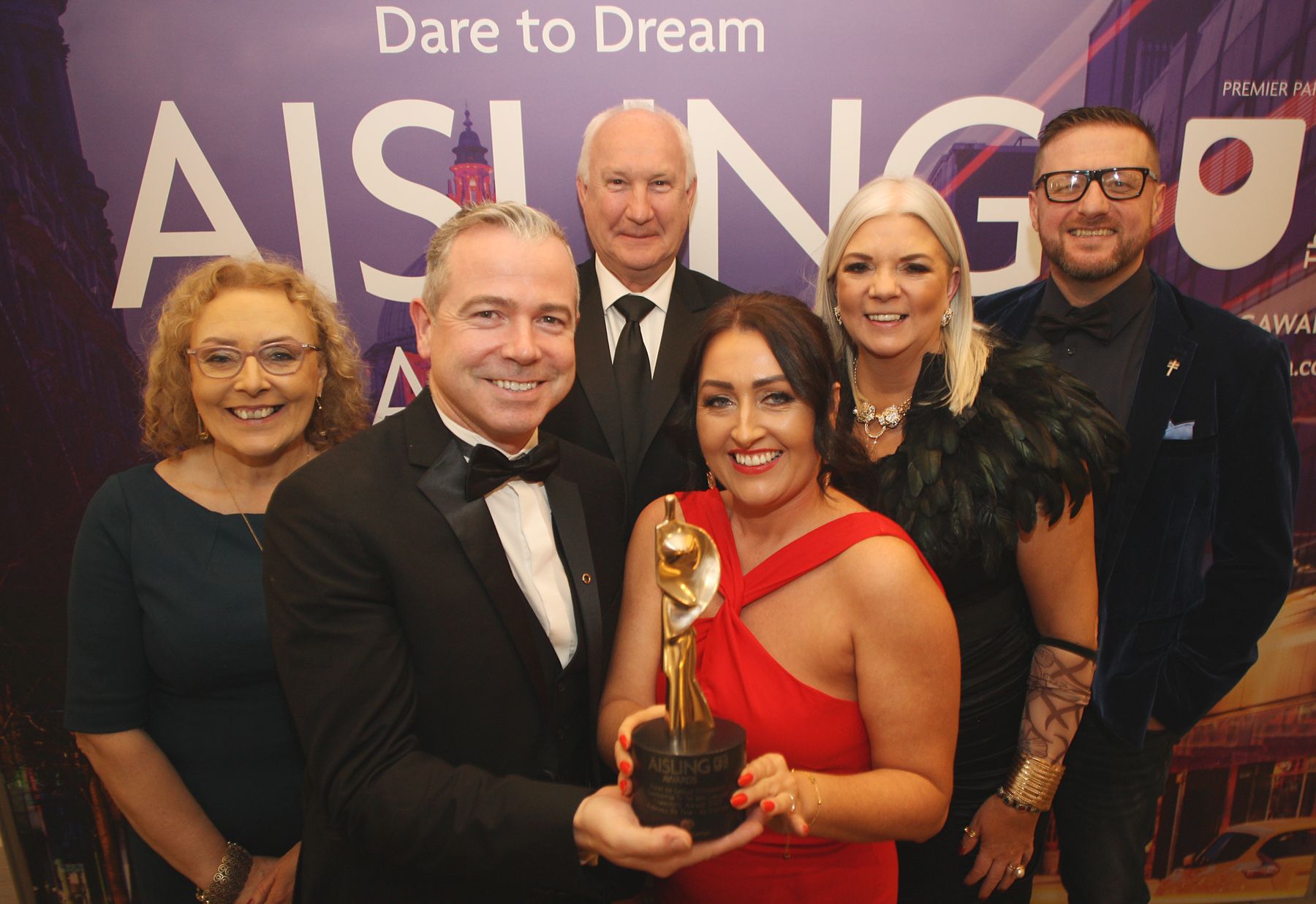 BUA: Fionnuala Nic Thom joins Pól Deeds and the team at An Droichead to pick up the Gaelige honours at the Aisling Awards last night. 