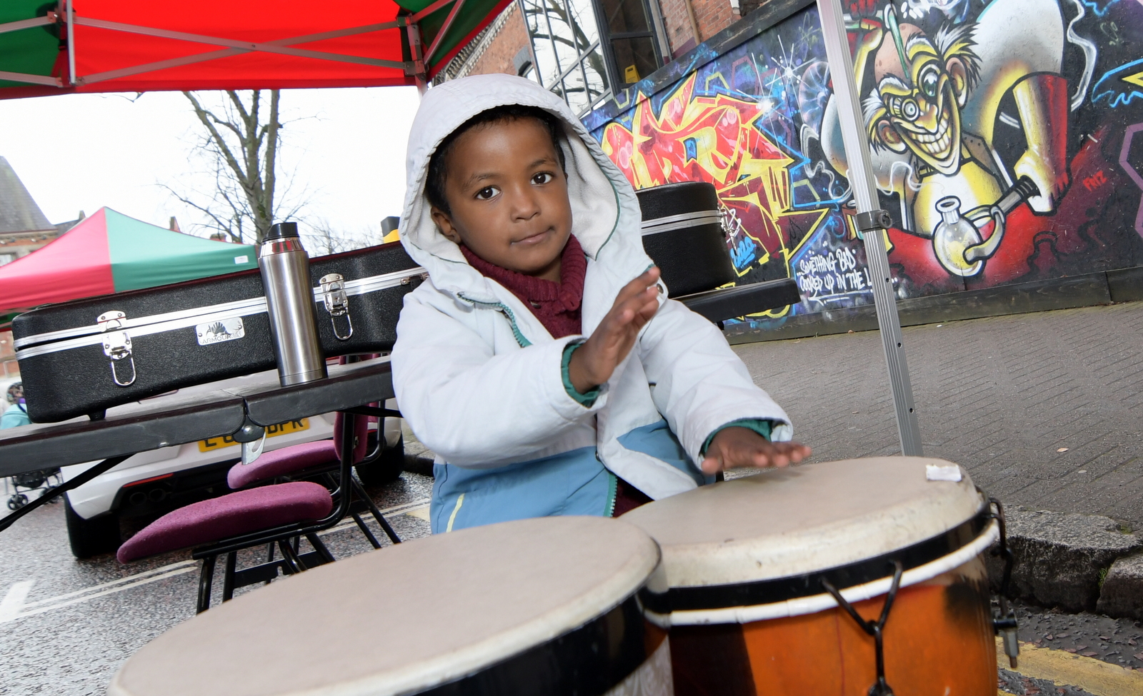 DRUMS: Three-year-old Mohammed Alaaldien playing drums during the drum circle at the Open Botanic Festival. 