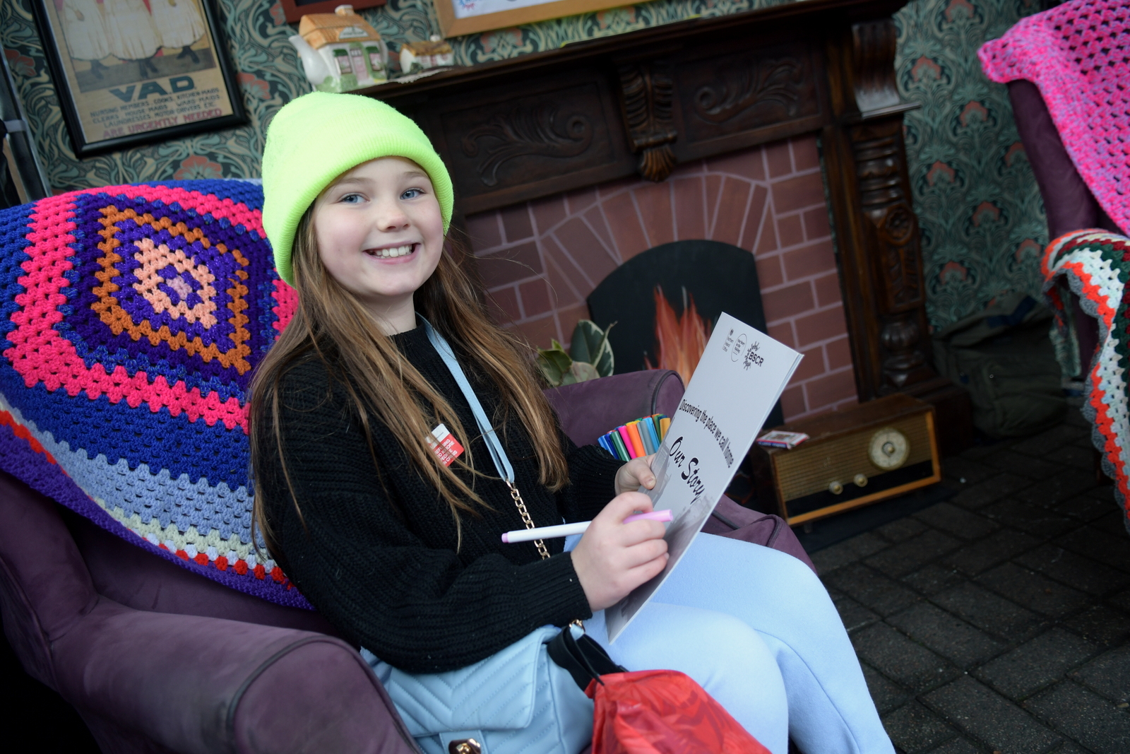 READING: Hannah Rose Burns (8) enjoyed Granny’s Living Room – a display by residents of Sandy Row as part of the project exploring the future of the area. 