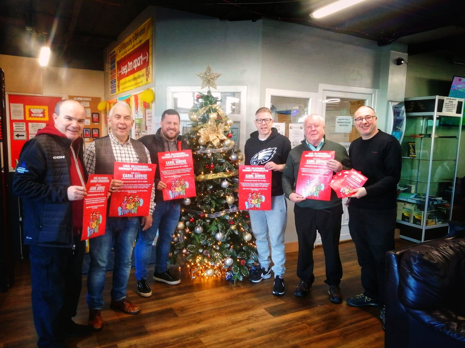 CAROLS: Fr Brian Watters, Tommy Latimer, Pastor Nathan Brown Pastor Jonathan McKee and Robert McClenaghan joined Kevin Morrison from Féile an Phobail to launch the event
