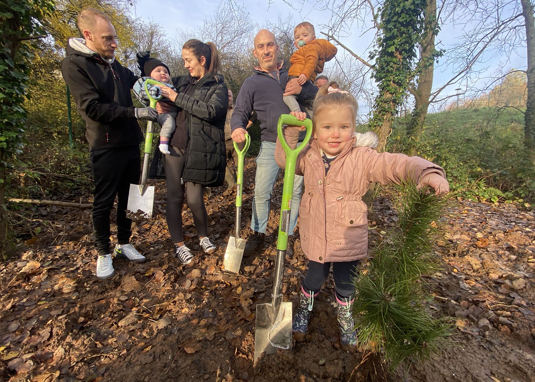 TREE PLANTING: Families from Colin Sure Start planted 200 blackthorn trees in the new Páirc Nua Chollan