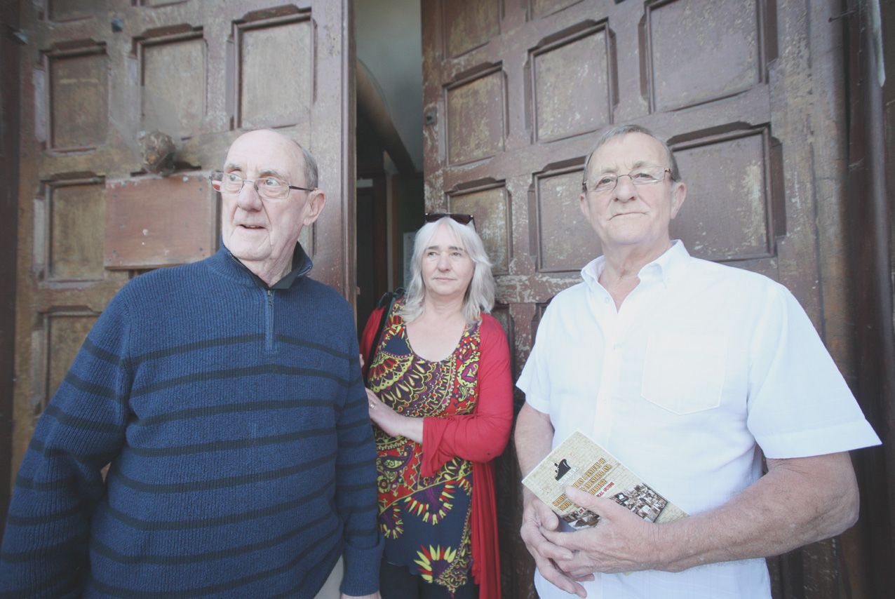 FLASHBACK TO 2017: Sailortown regeneration campaigners Jack McKay, Terry McKeon and Danny McKay gather at the door of St Joseph\'s Church to highlight restoration demands