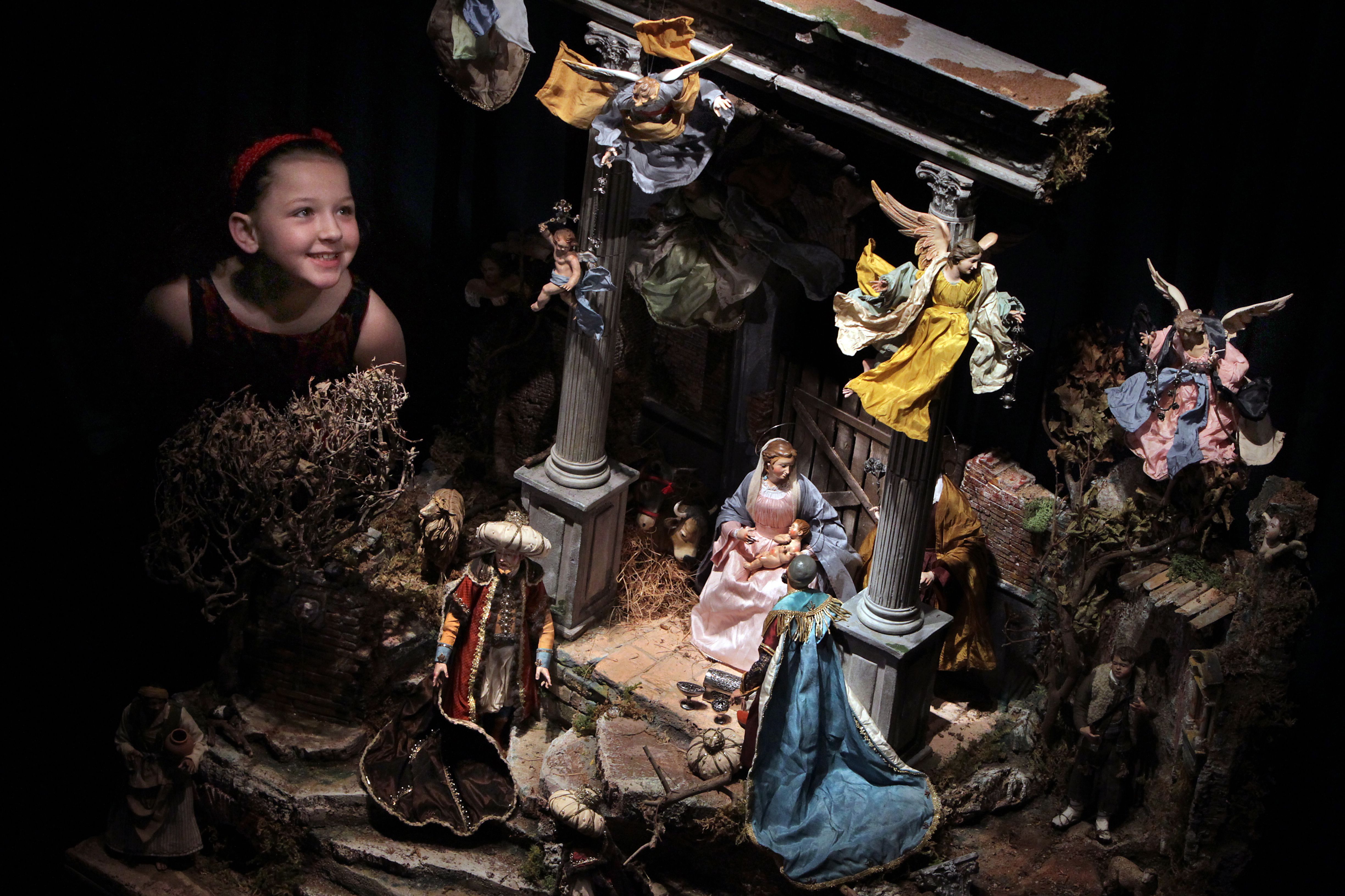 FESTIVE BLESSINGS: A child looks in wonder at the Neapolitian crib in Dublin Castle                   