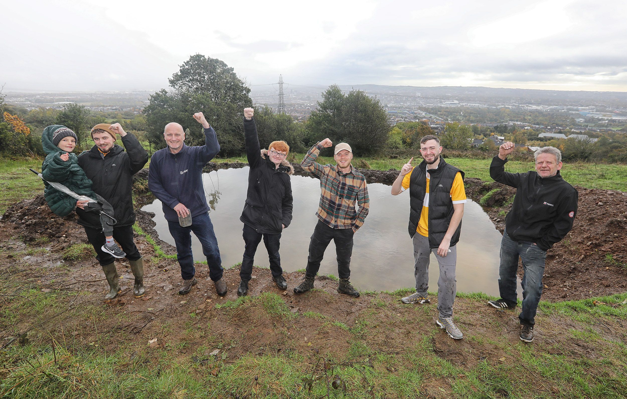 FOR LOVE OF NATURE: Volunteers help award-winning nature activist Aaron Kelly dig out a wildlife pool on Divis Mountain this year