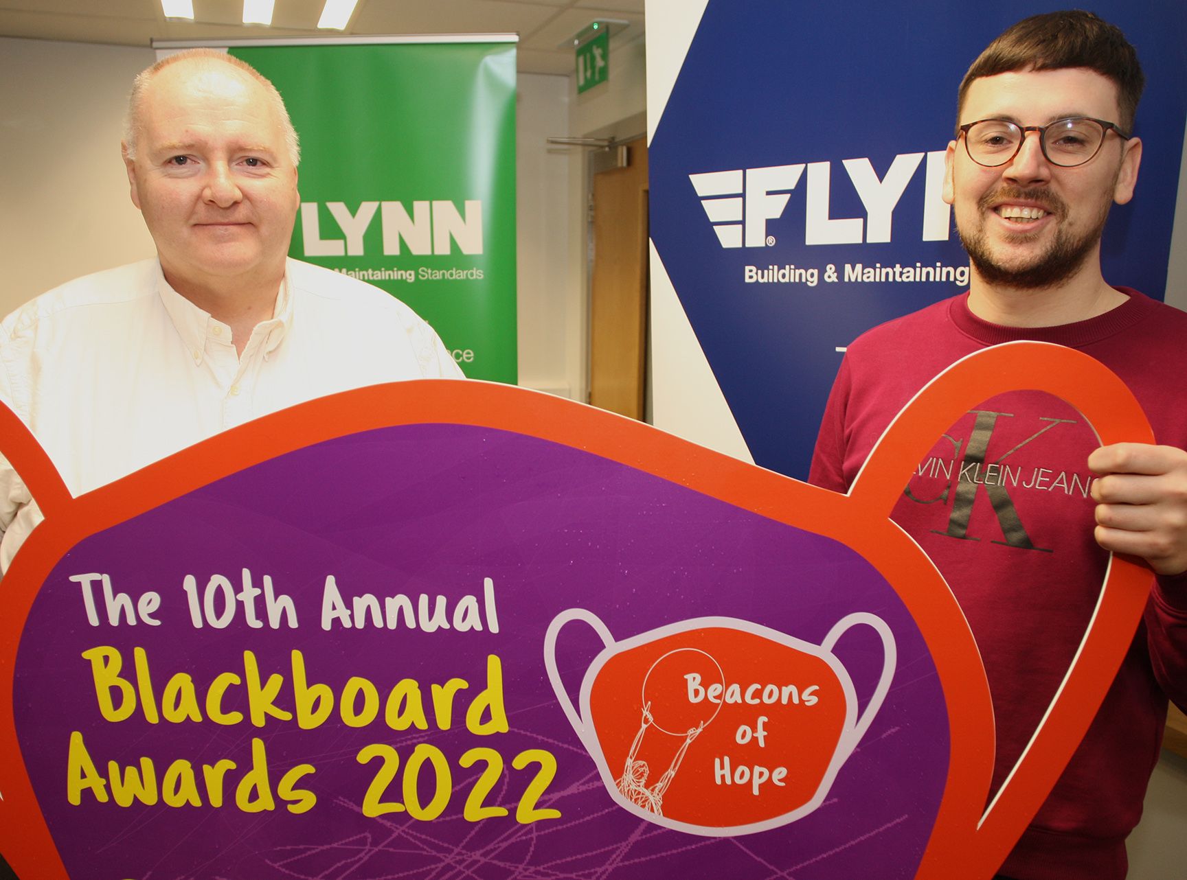 BUILDING BLOCKS: FLYNN Managing Director, Aidan Flynn, with Andersonstown News journalist, Michael Jackson