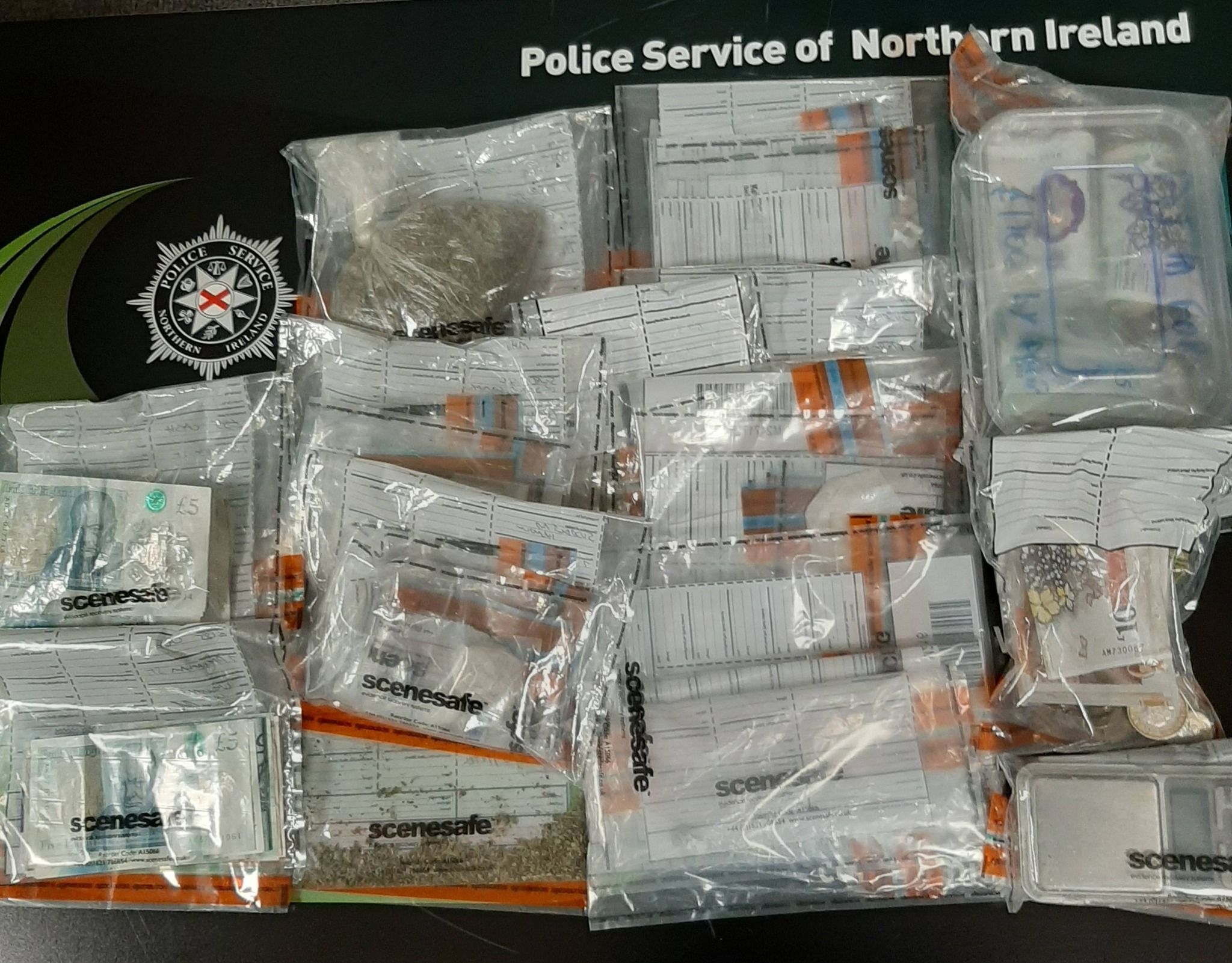 HAUL: Cash and drugs seized by police