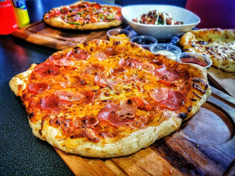 PIZZA THE ACTION: To celebrate one year since they originally opened, Jose\'s Deli have updated their menu to include pizza and other fan favourites 