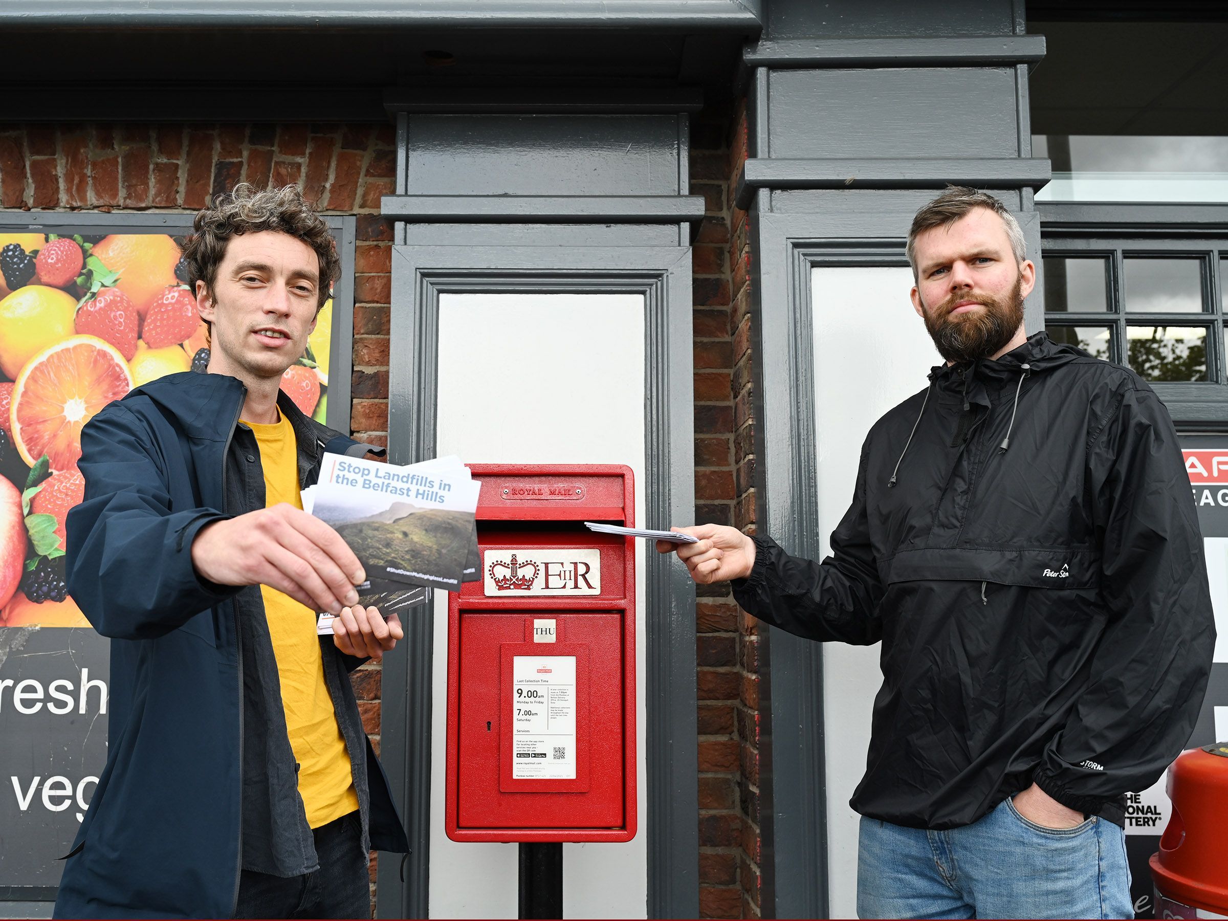 STAMP IT OUT: Cllr Michael Collins and Gerry Carroll MLA submit postcards calling for the closure of Mullaghglass