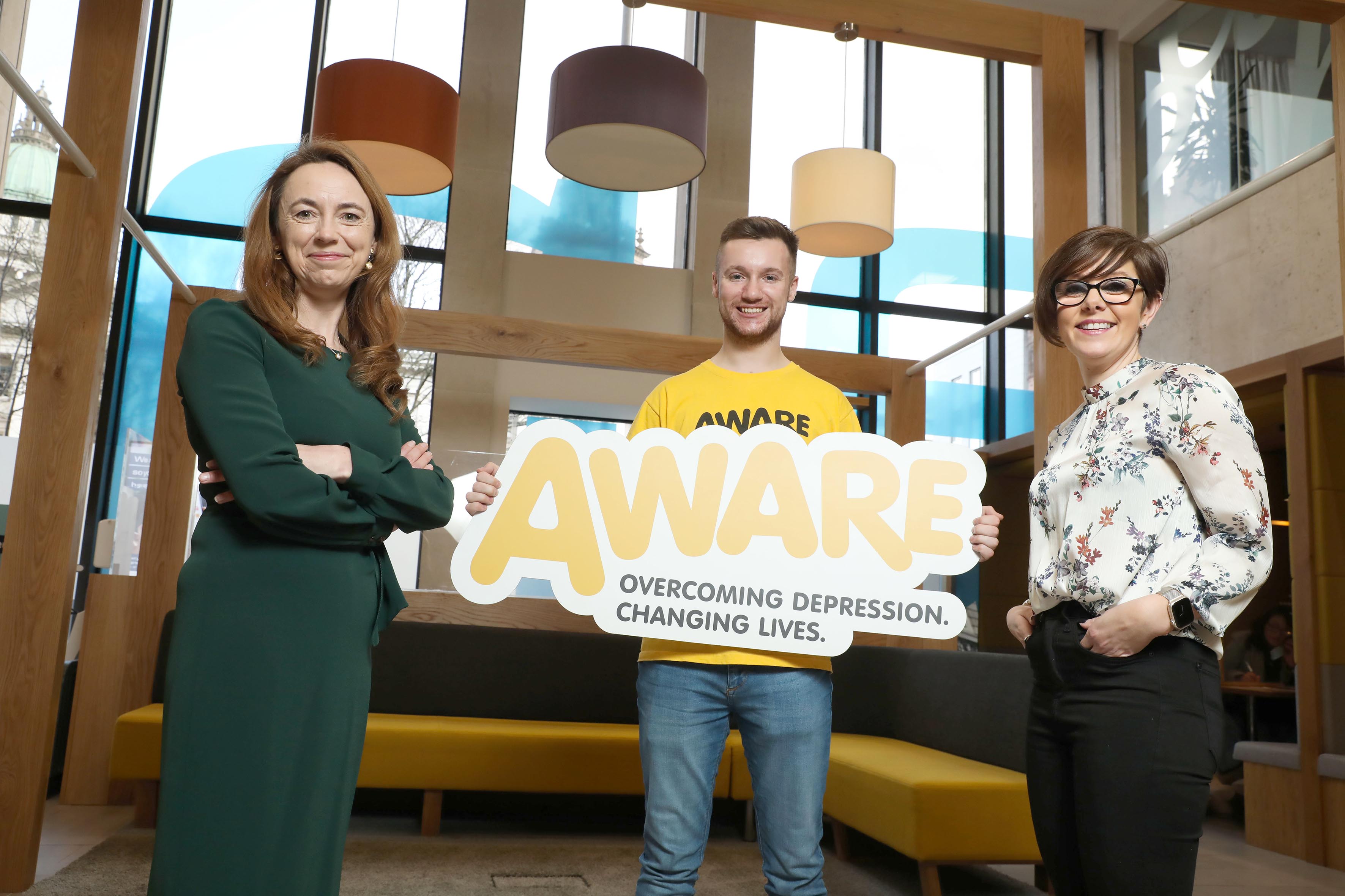 TOGETHER: Karen Collins, AWARE NI Chief Executive, Vicky Davies, Danske Bank Chief Executive, and Scott Waite, Trainee Personal Banker.