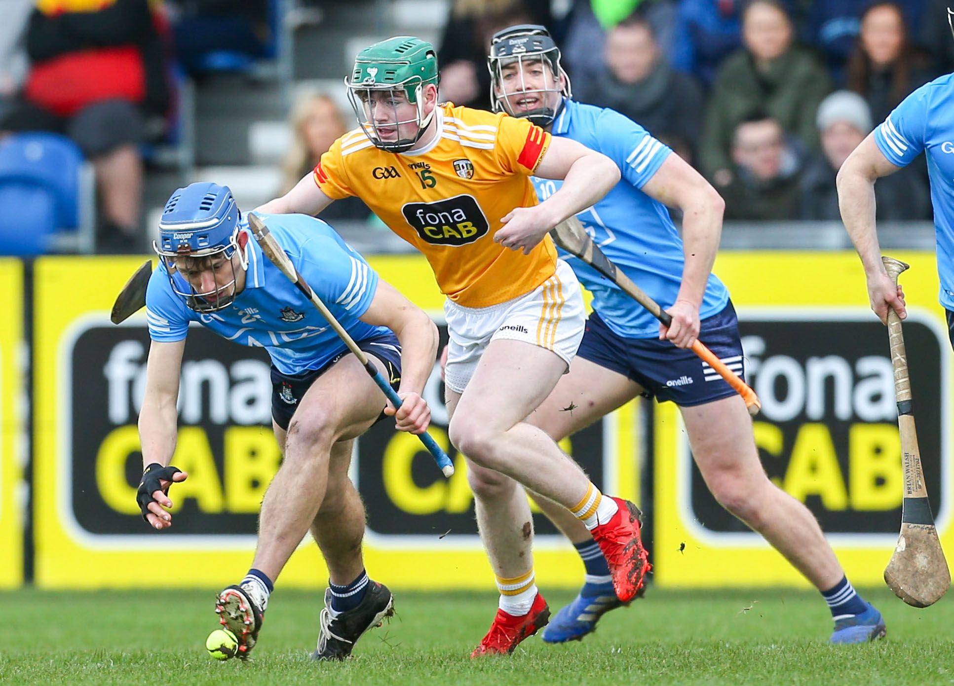 Paul Crummey is first to the ball as Conal Cunning closes in on Saturday 