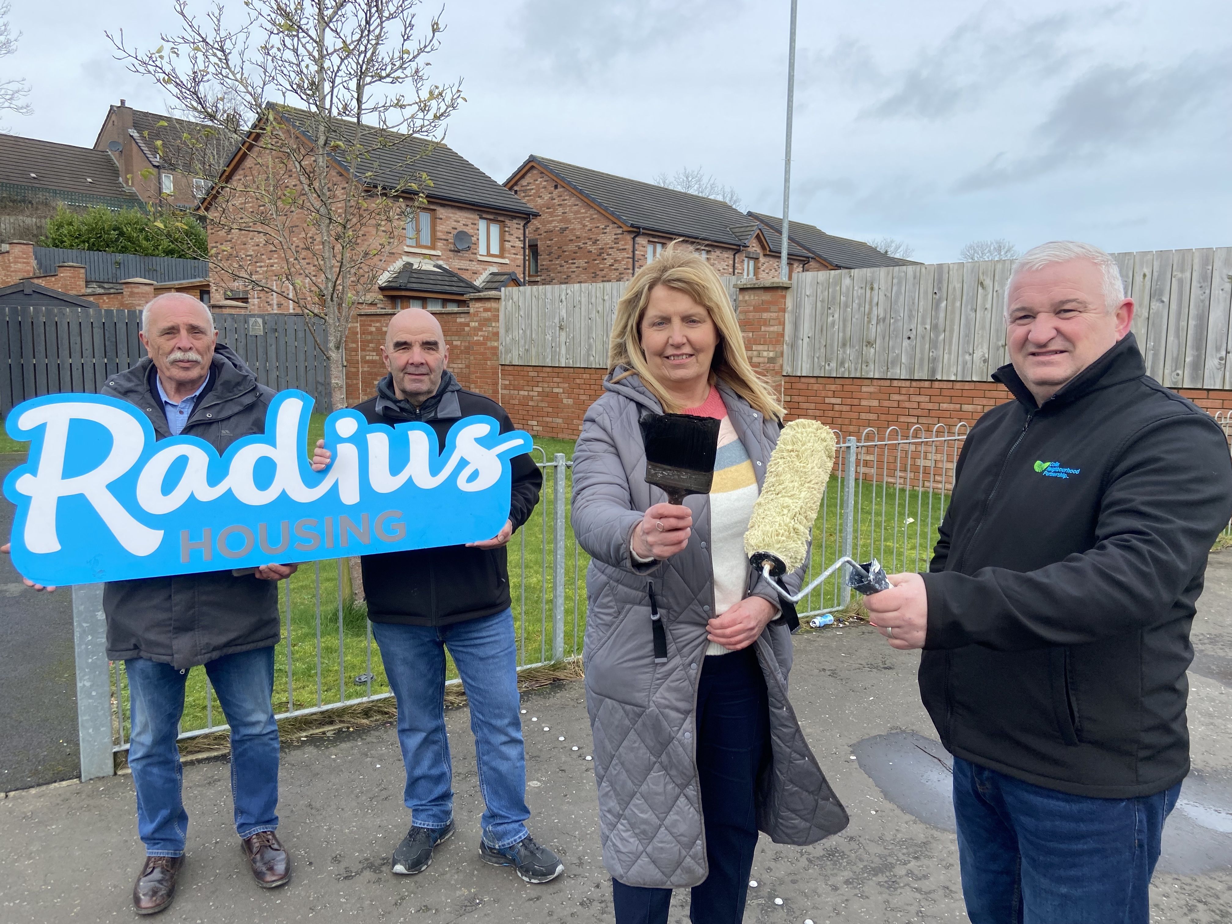 CLEAN UP: Desmond Walsh and Umberto Scappaticci (Colin Men’s Shed), Fiona McAuley (Radius Housing) and Brendan McAteer from Colin Neighbourhood Partnership