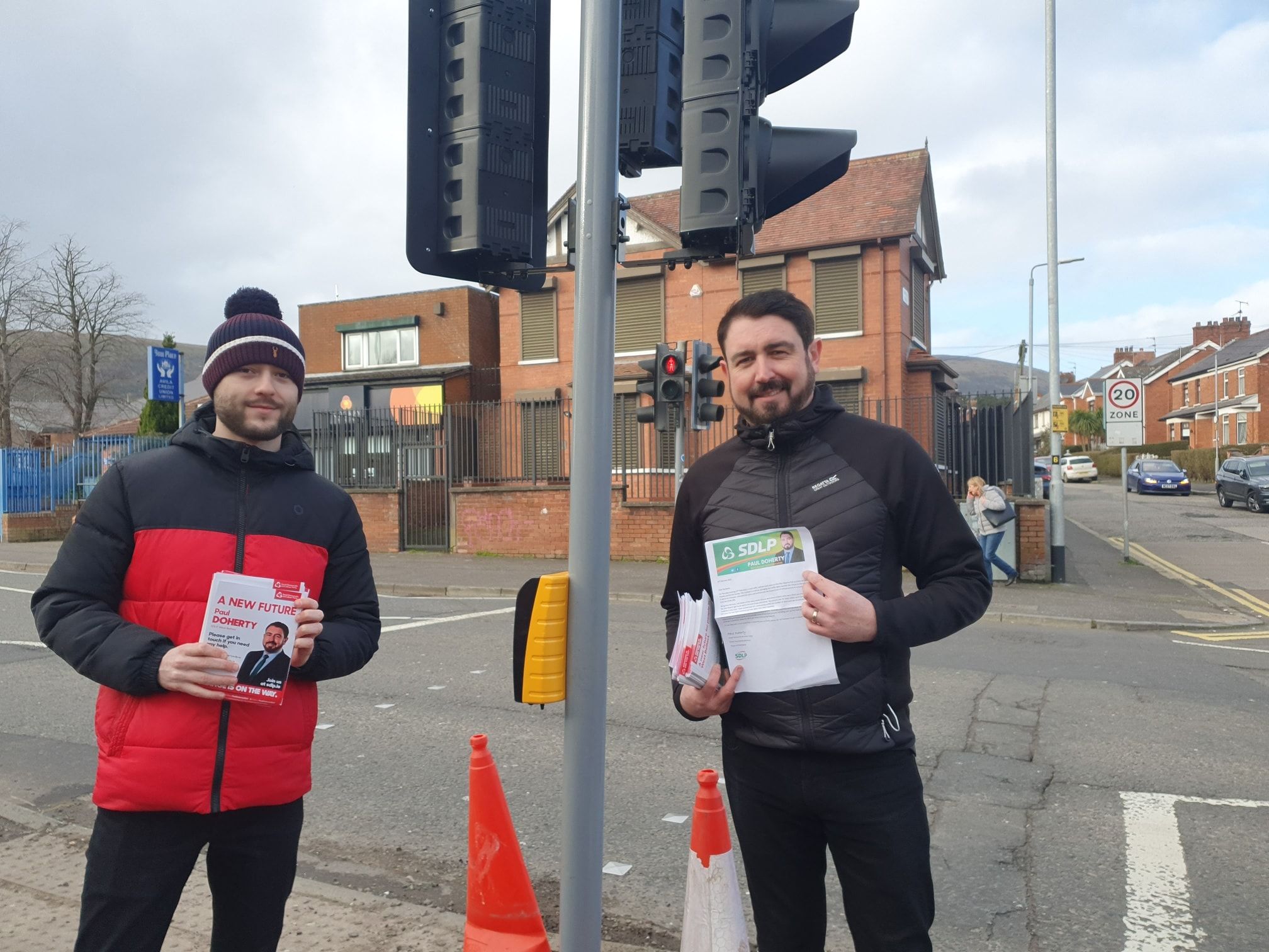 REPLACED: SDLP rep Paul Doherty, right, has welcomed the swift action of DFI in replacing the damaged traffic lights