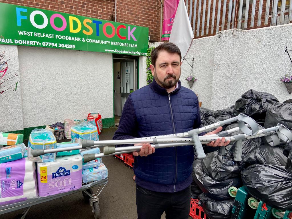 APPEAL: Foodstock\'s Paul Doherty holds crutches destined to help the injured in Ukraine