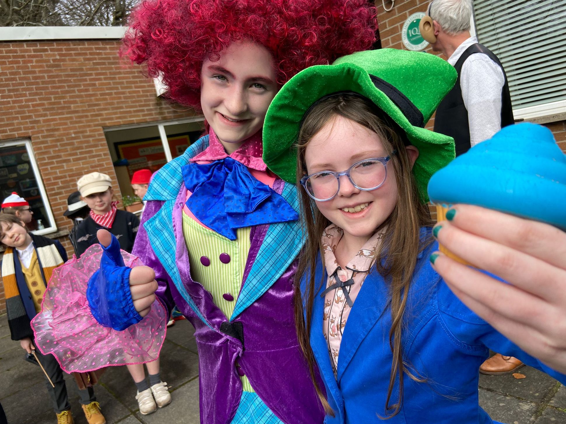 MAD AS A HATTER: Leah and Mary took a trip to wonderland on their way to school this morning