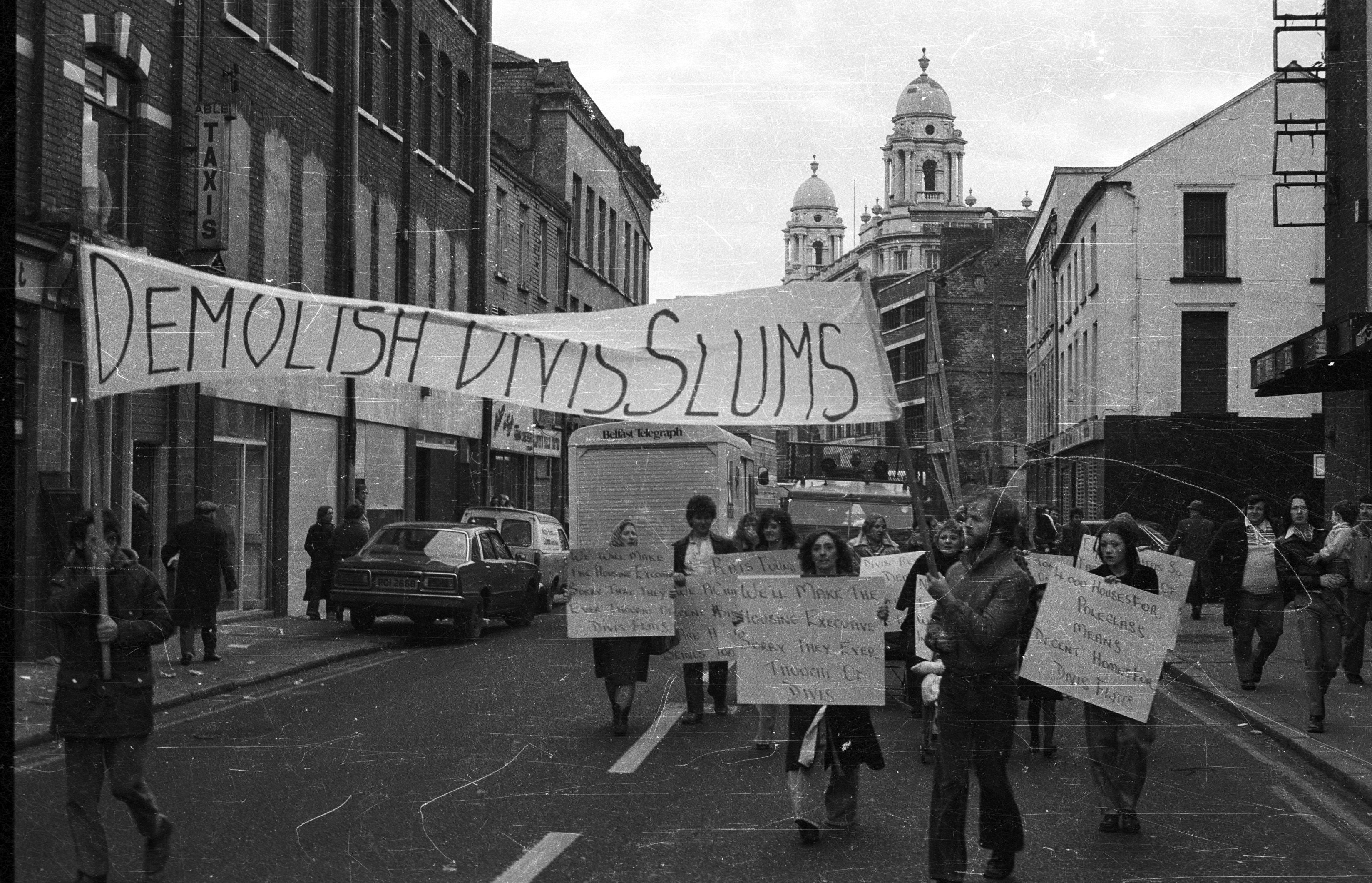DEMOLITION DEMANDS: Residents of Divis Flats march to the headquarters of the Housing Executive in 1979