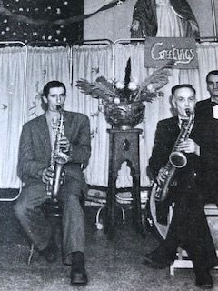 JAZZ DUO: The author\'s dad Frank and granda Tommy Liddy playing at the Christmas ball for the Mater Hospital nurses