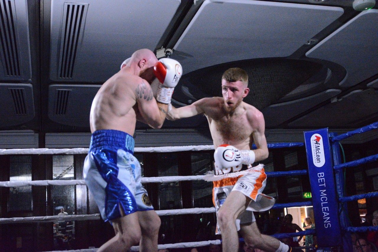 Ruadhan Farrell in action against Jamie Quinn