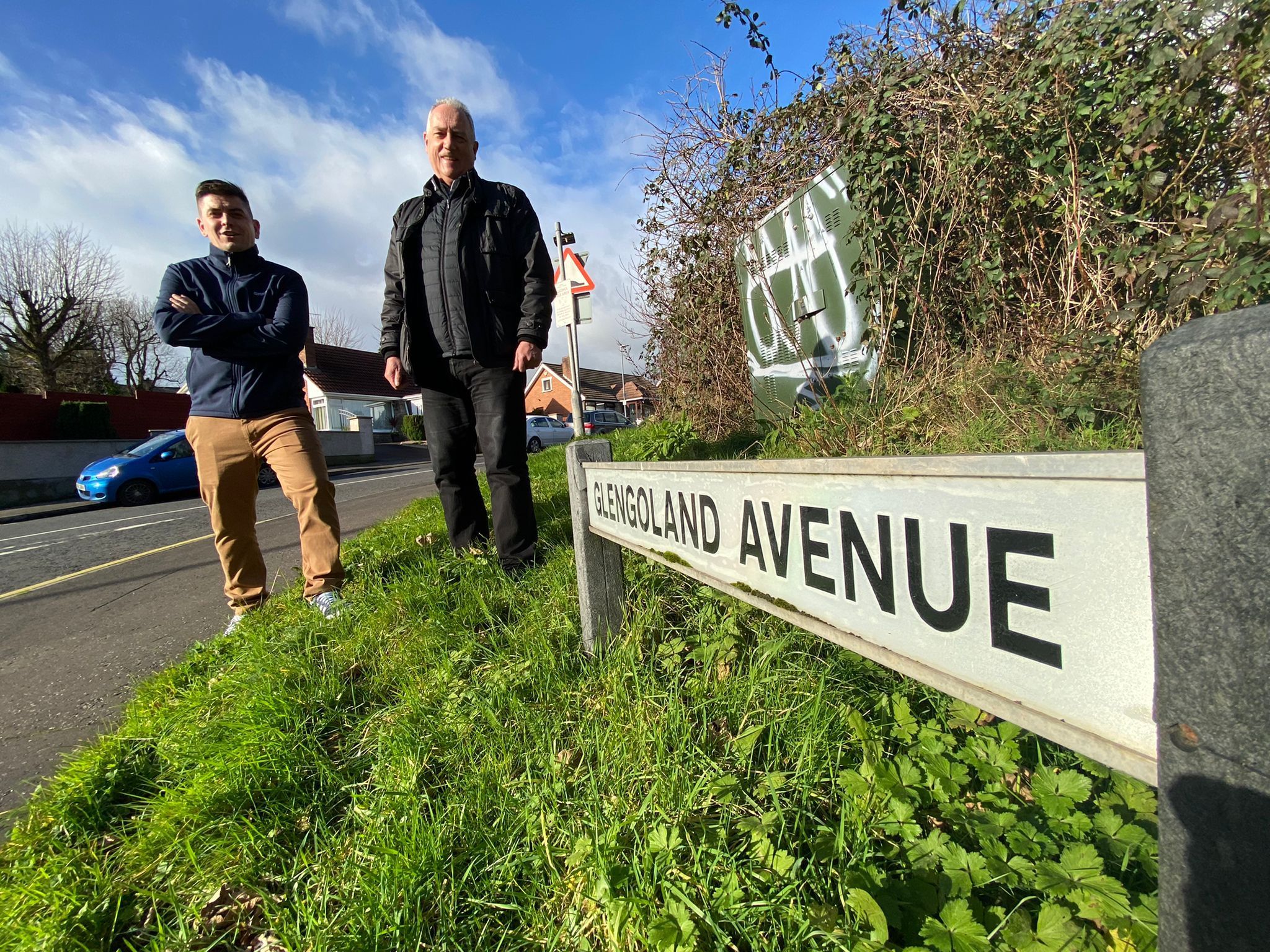WELCOME NEWS: Cllr Danny Baker and Cllr Séanna Walsh have been working with residents alongside MP Paul Maskey to address concerns regarding the junction 