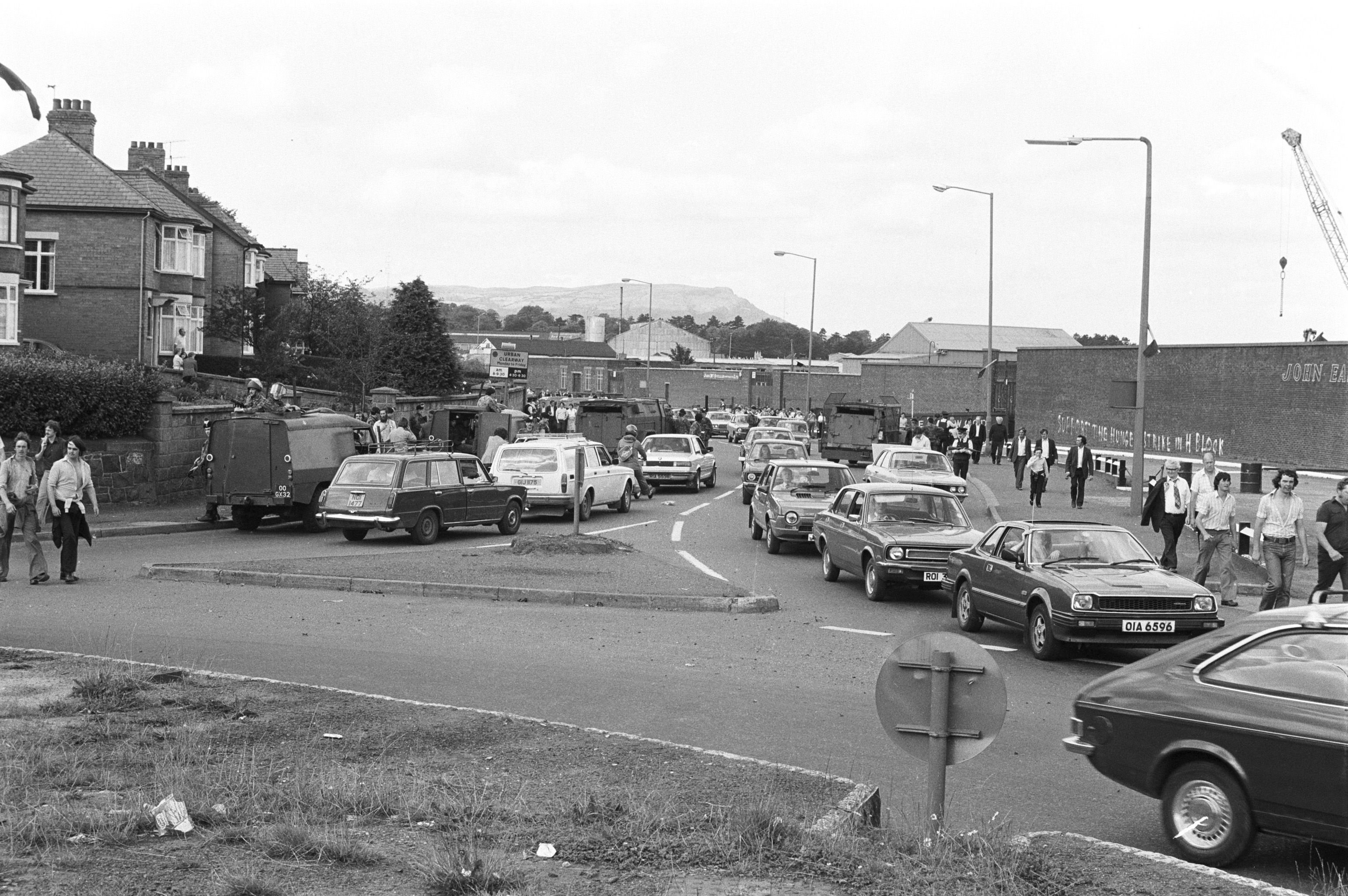 1981 on the Andersonstown Road and an Eastwoods crane goes about its work