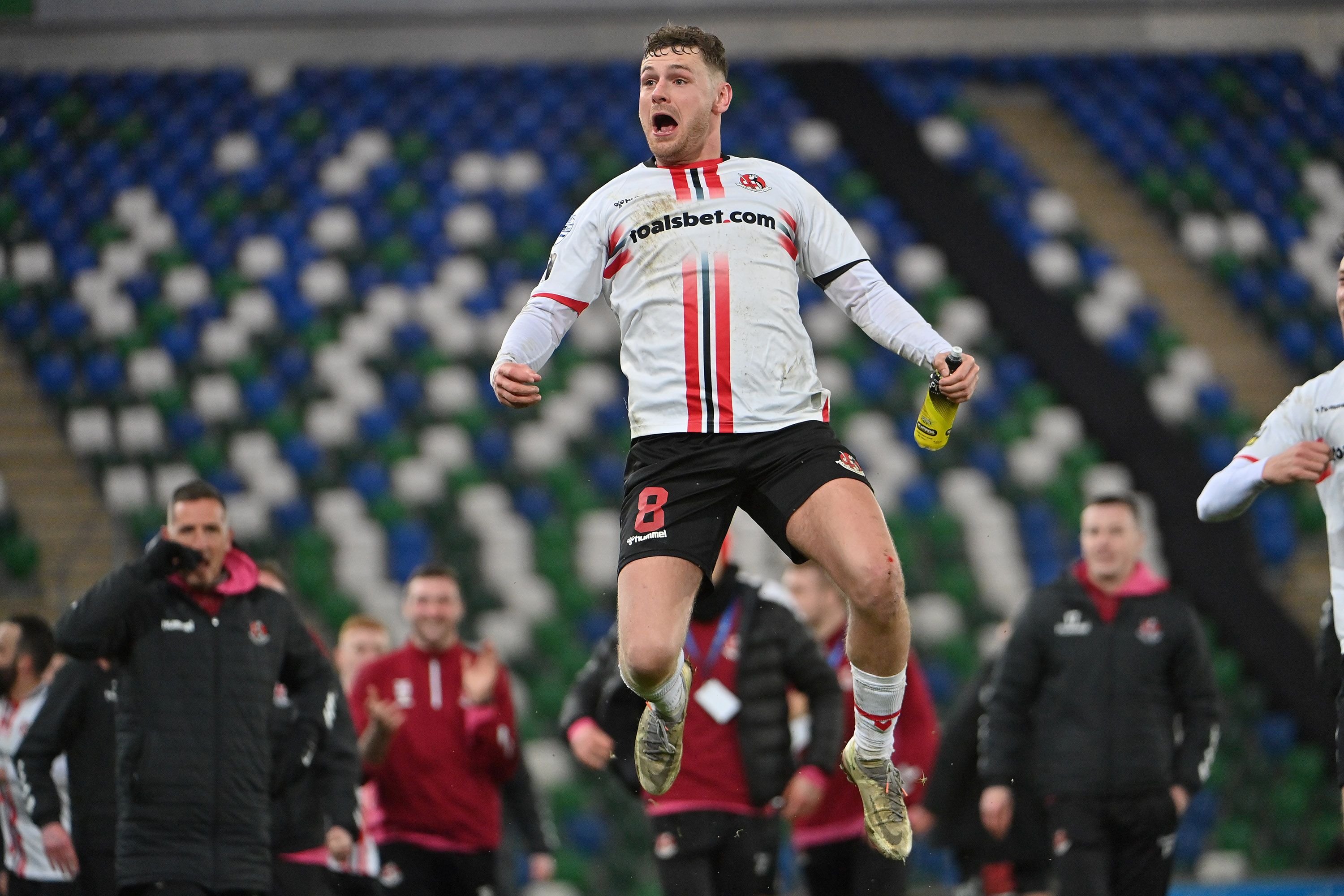 Ben Kennedy celebrates with the Crusaders supporters at the final whistle