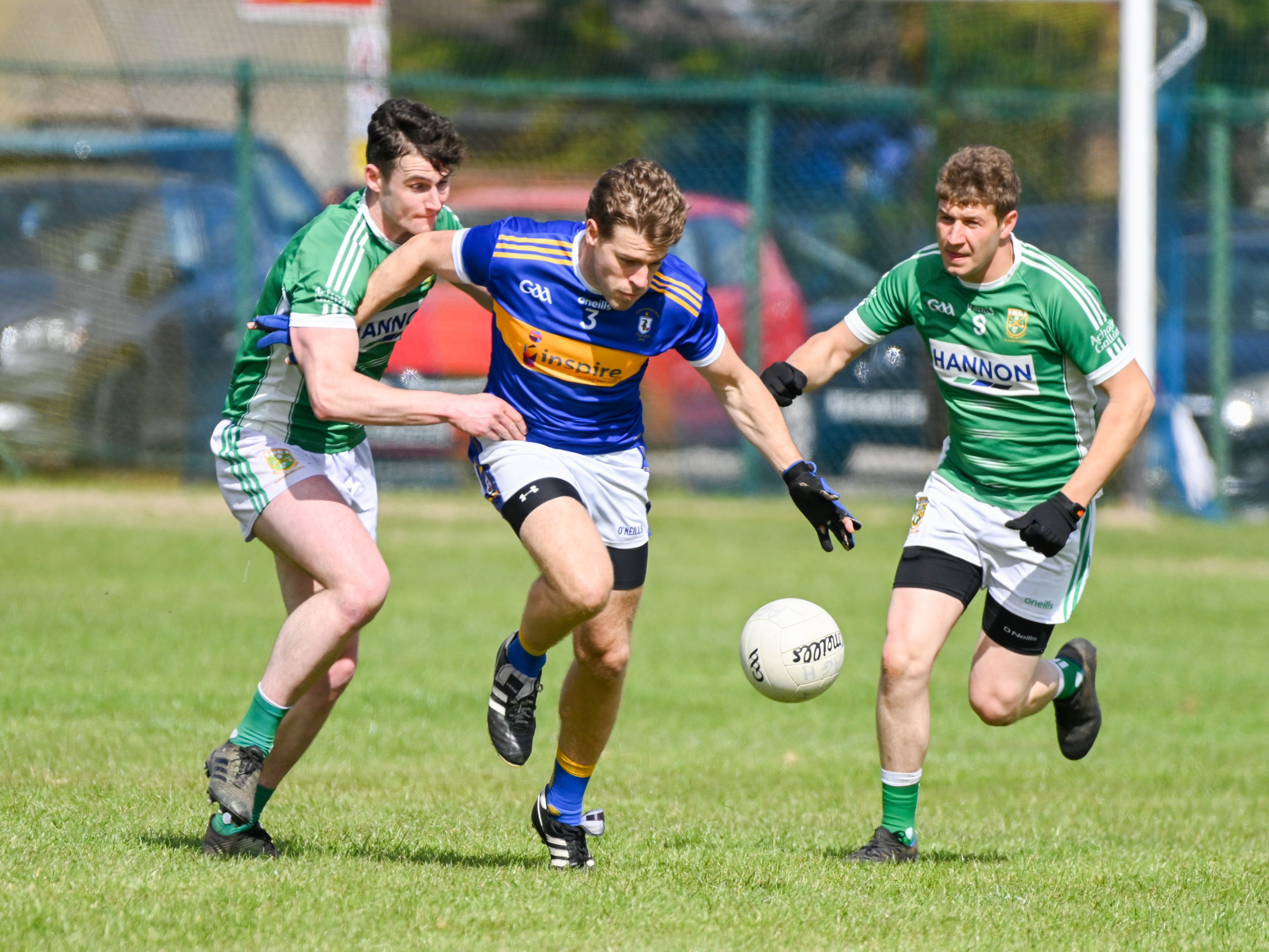 Stephen Shannon is challenged during Sunday\'s game against Aghagallon