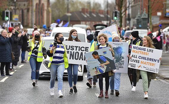 CAMPAIGN: Fiona Donohoe (fifth from left) at a Justice for Noah march; inset left, Noah Donohoe