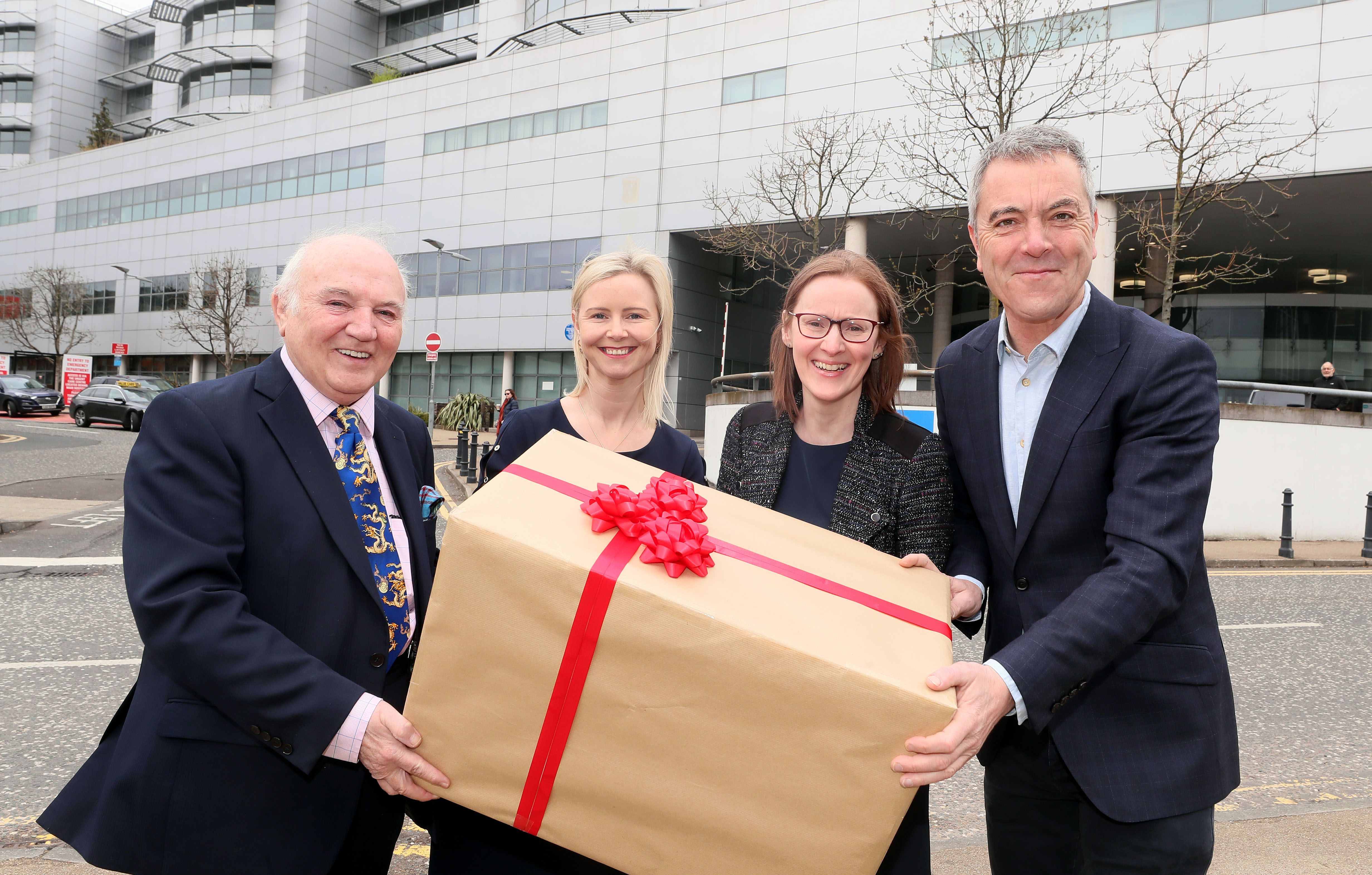 DONATION: Dr Terry Cross OBE,  Linda Hamilton, Assistant Service Manager in Paediatric Ophthalmology; Ms Eibhlin McLoone, Belfast Trust Consultant Paediatric Ophthalmologist and actor James Nesbitt