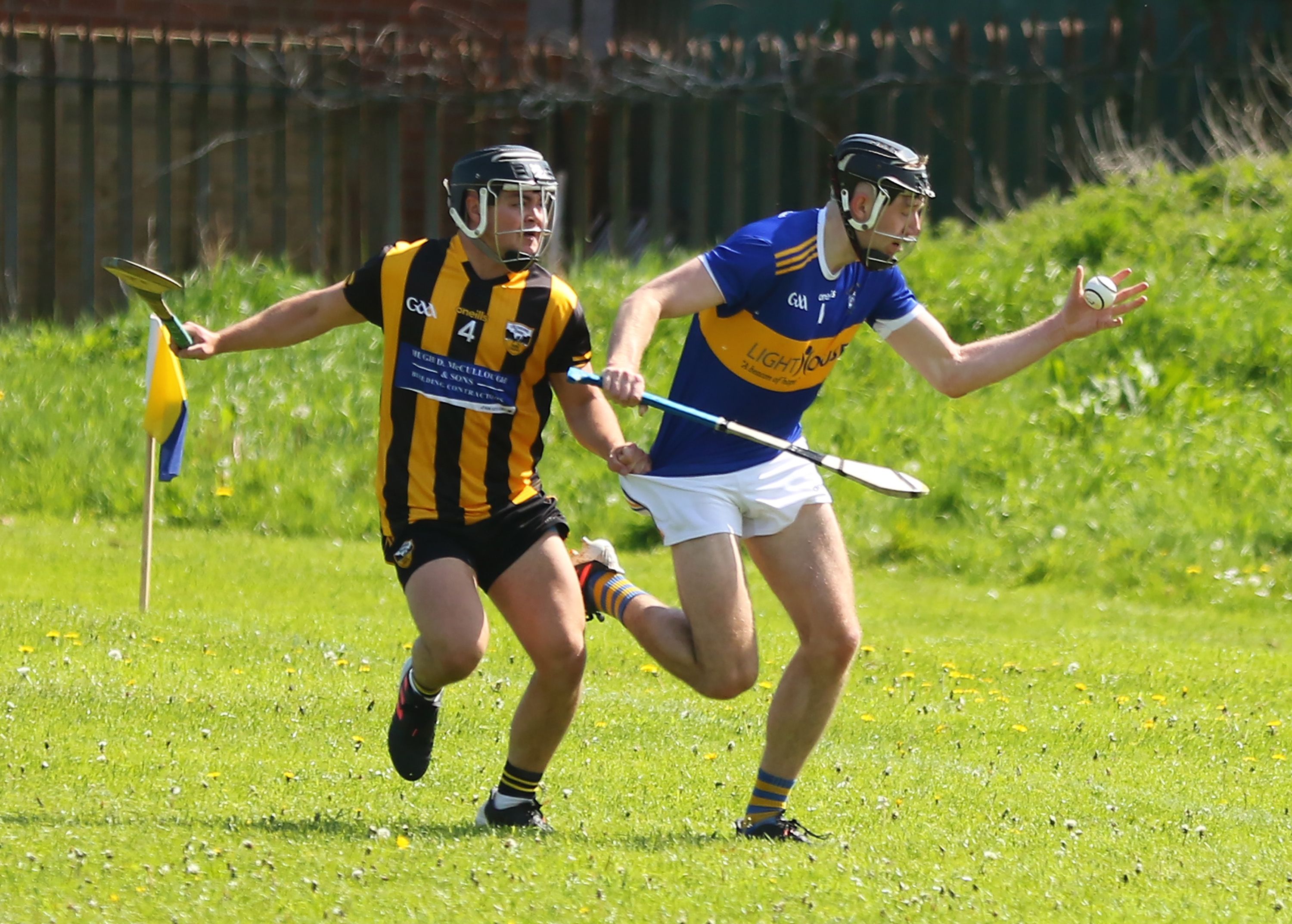 Aodhán O\'Brien gets out in front of Rory Brown during Sunday\'s game at Rossa Park