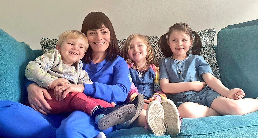 BACK HOME: Nichola Mallon relaxes with her children after the count