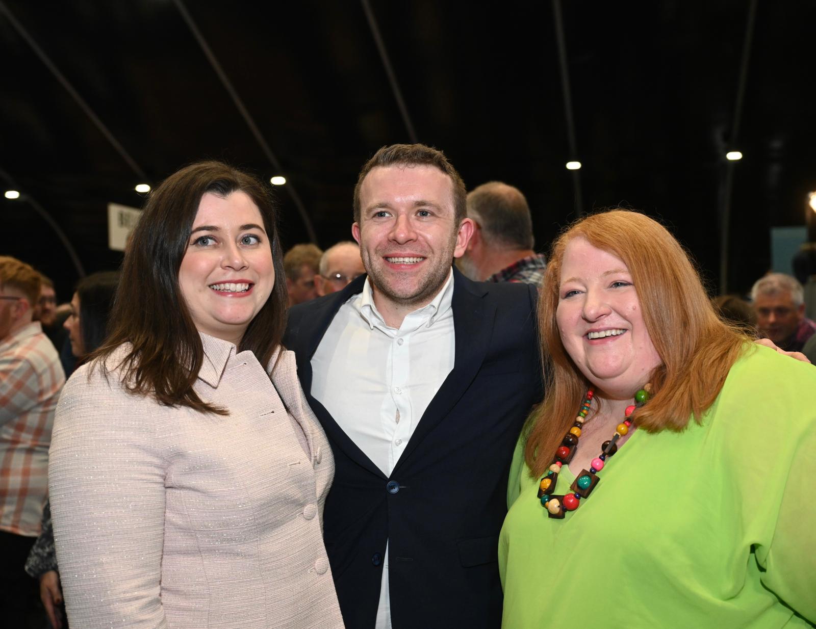 JOYOUS: Peter McReynolds celebrates his election with his wife Eileen and party leader, Naomi Long MLA