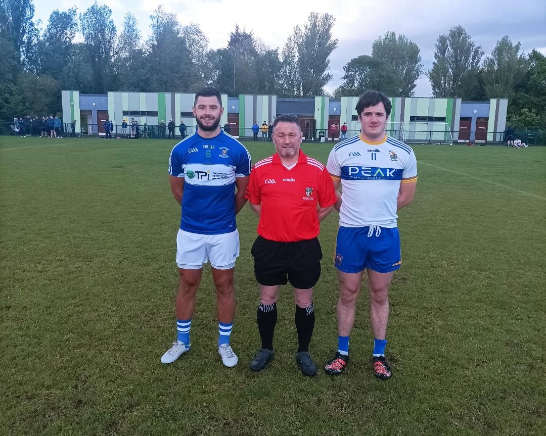 Team captains Padraig Nugent and Patrick Finnegan with referee Patrick Tumelty