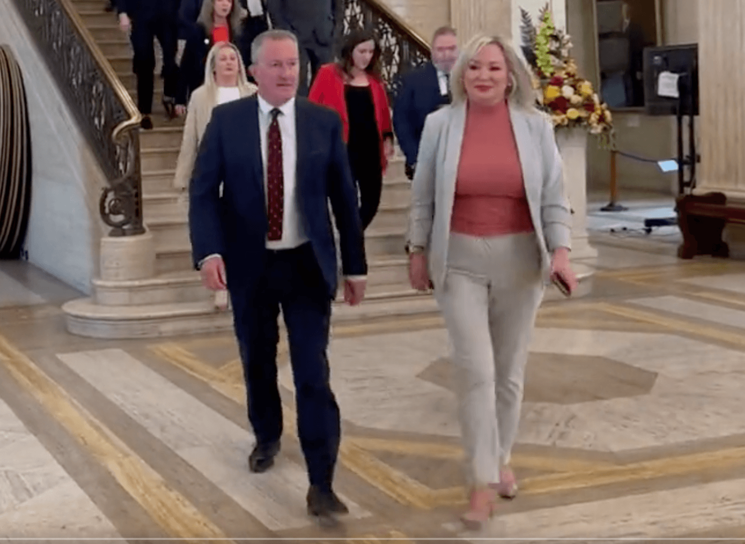 TOGETHER: Sinn Fein\'s Michelle O\'Neill and Conor Murphy lead the Sinn Féin\'s MLAs into the Assembly chamber