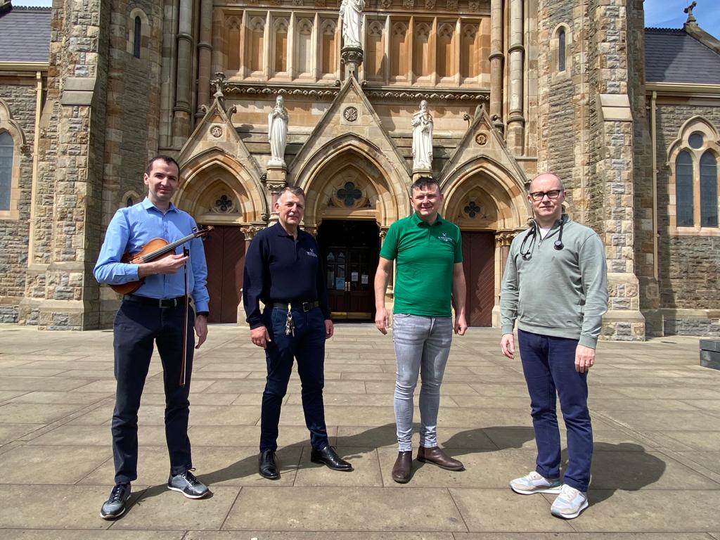 FUNDS: Dr Eoghan Ferrie, Joe McGuigan (The People\'s Kitchen), Liam Carville (The People\'s Kitchen) and John McCaffery outside Clonard Monastery