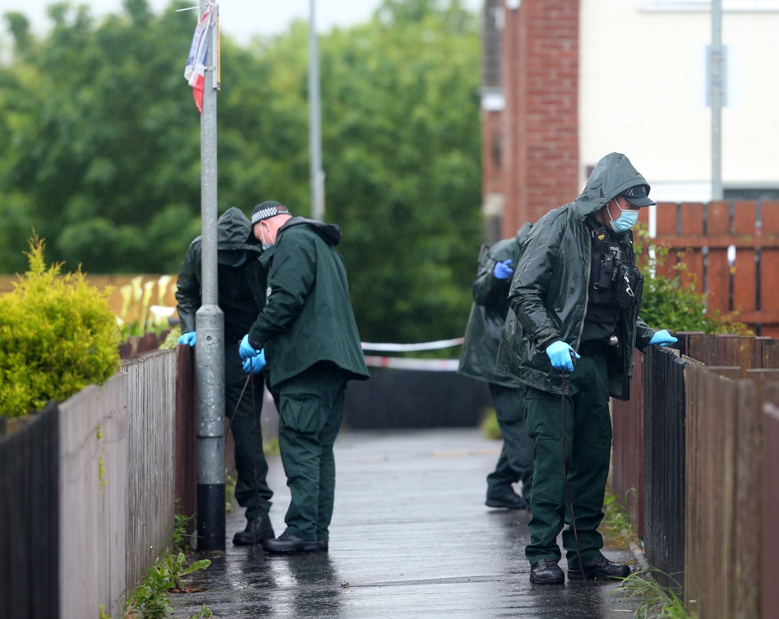 GUN ATTACK: Police at the scene of the shooting in Westland Way on Tuesday morning