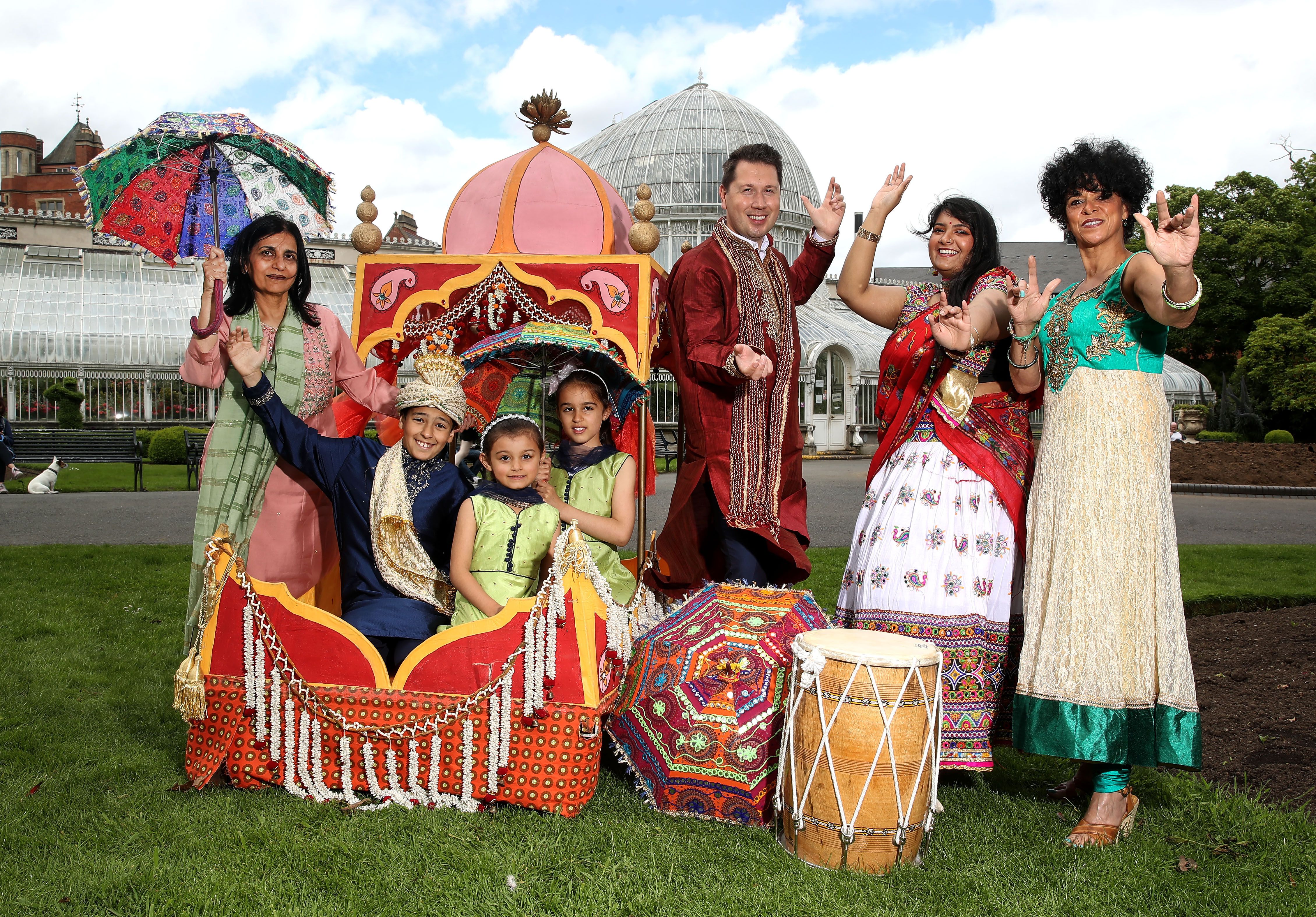 MELA IS BACK: Carolyn Stewart and UTV’s Paul Reilly with ArtsEkta founder Nisha Tandon and Bollywood dancer Dona Das Gupta with little Noa (9) Amelia (8) and Aria (4) in Botanic Gardens