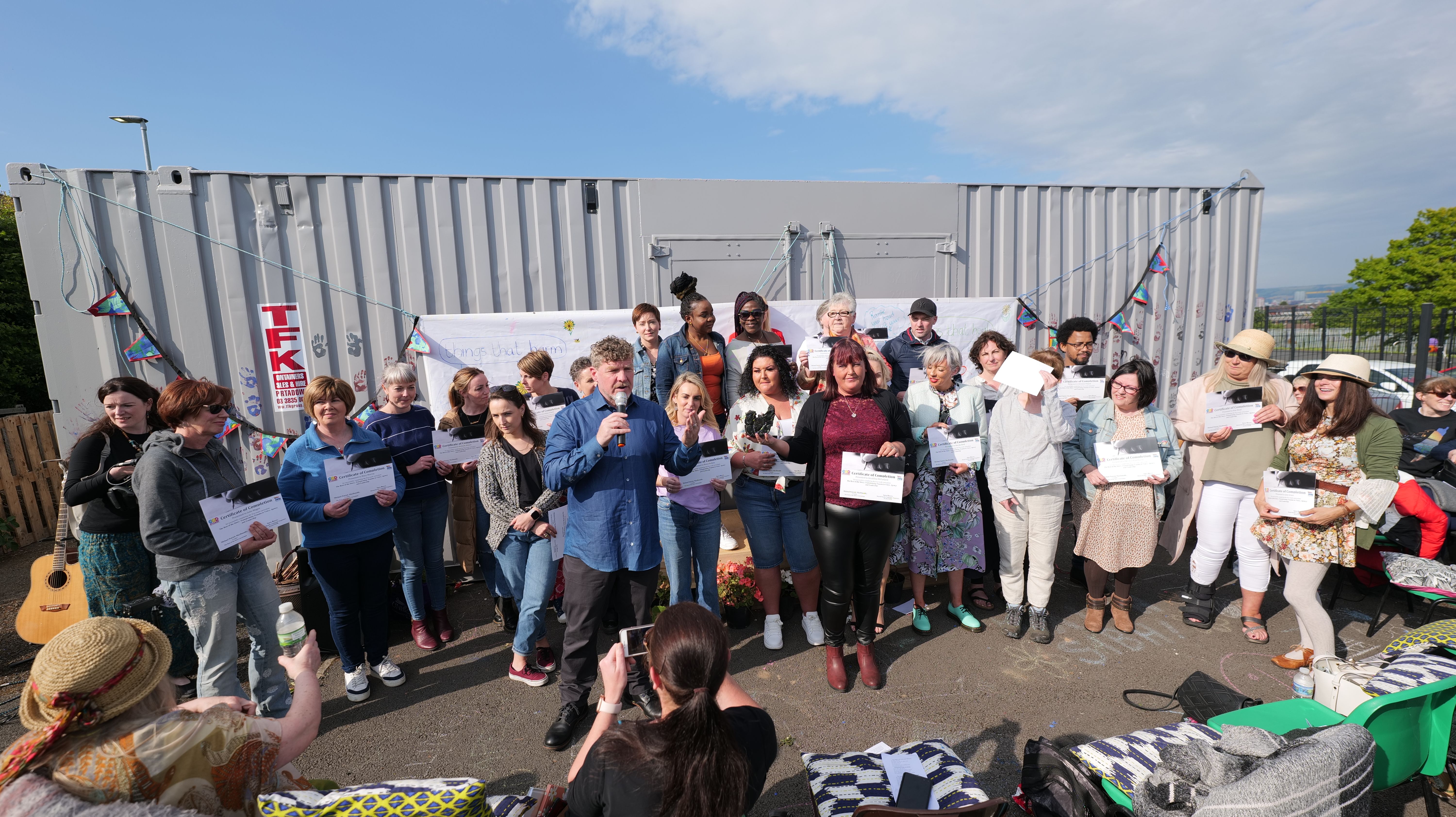 GRADUATION: Michael Patrick MacDonald with participants from the \'Rest of the Story\' project at the People\'s Garden on the Whiterock