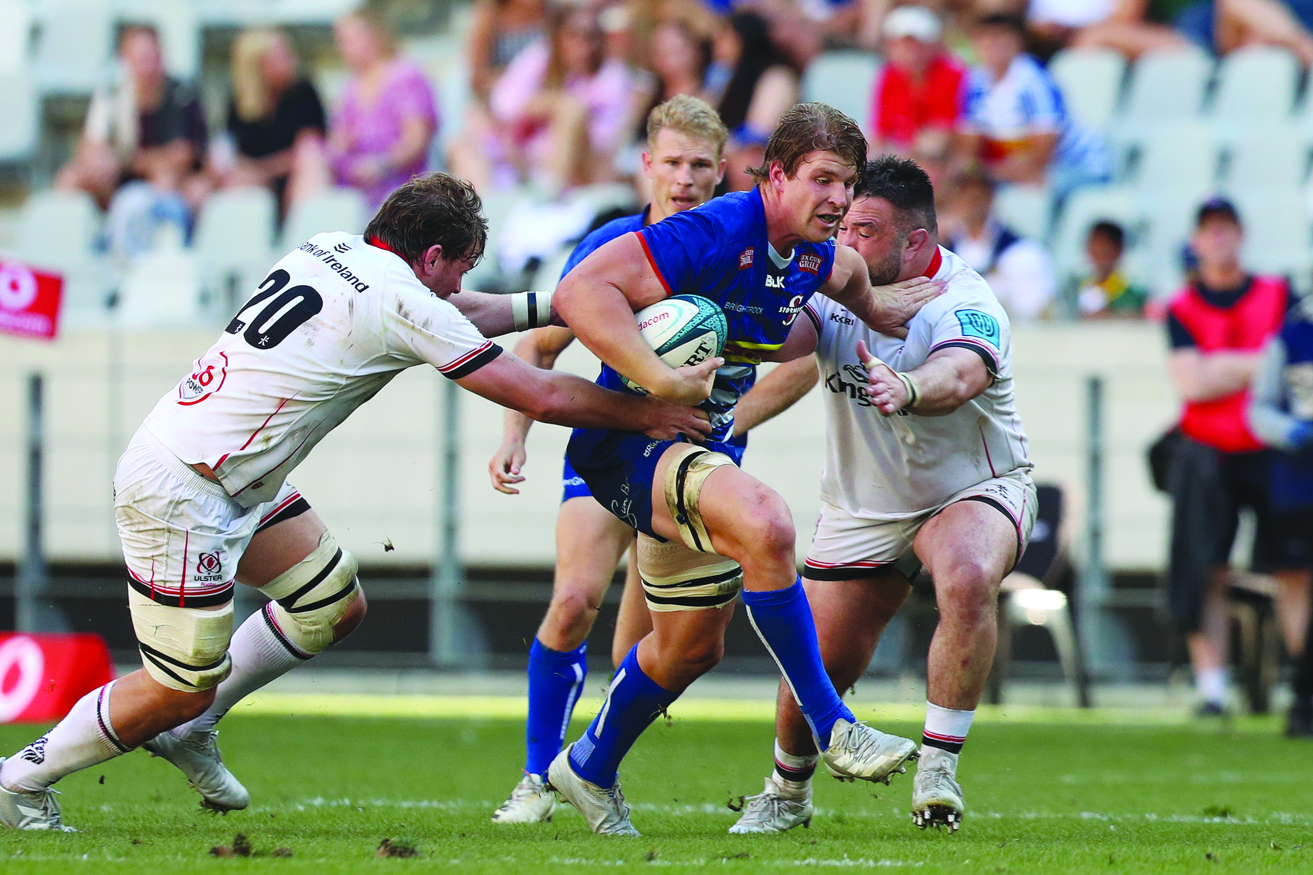 Evan Roos bursts past Jordi Murphy and Marty Moore earlier this season when the Stormers edged out Ulster 23-20