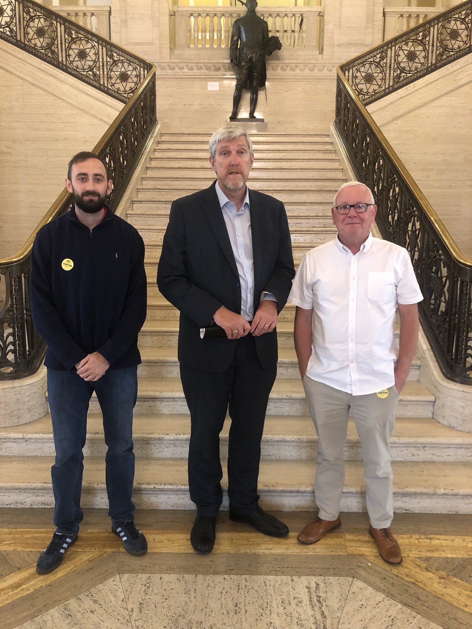 MEETING: Piaras Mac Alastair (left) and Jake Mac Siacais (right) from Forbairt Feirste with Infrastructure Minister John O\'Dowd