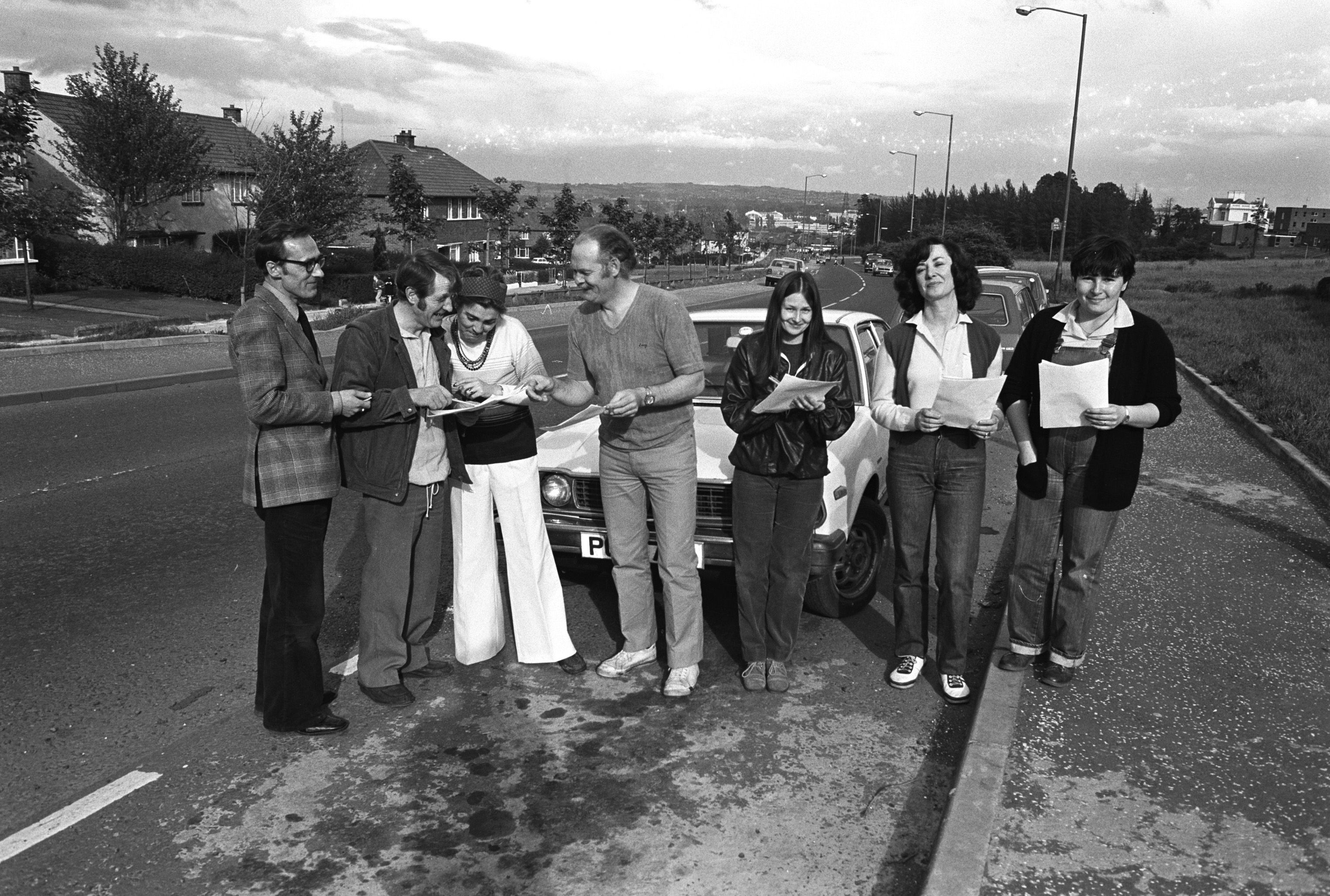 Former editor of the Andersonstown News, Basil McLaughlin, leads his team during the bilingual treasure hunt in aid of St Paul\'s, on the Shaw\'s Road